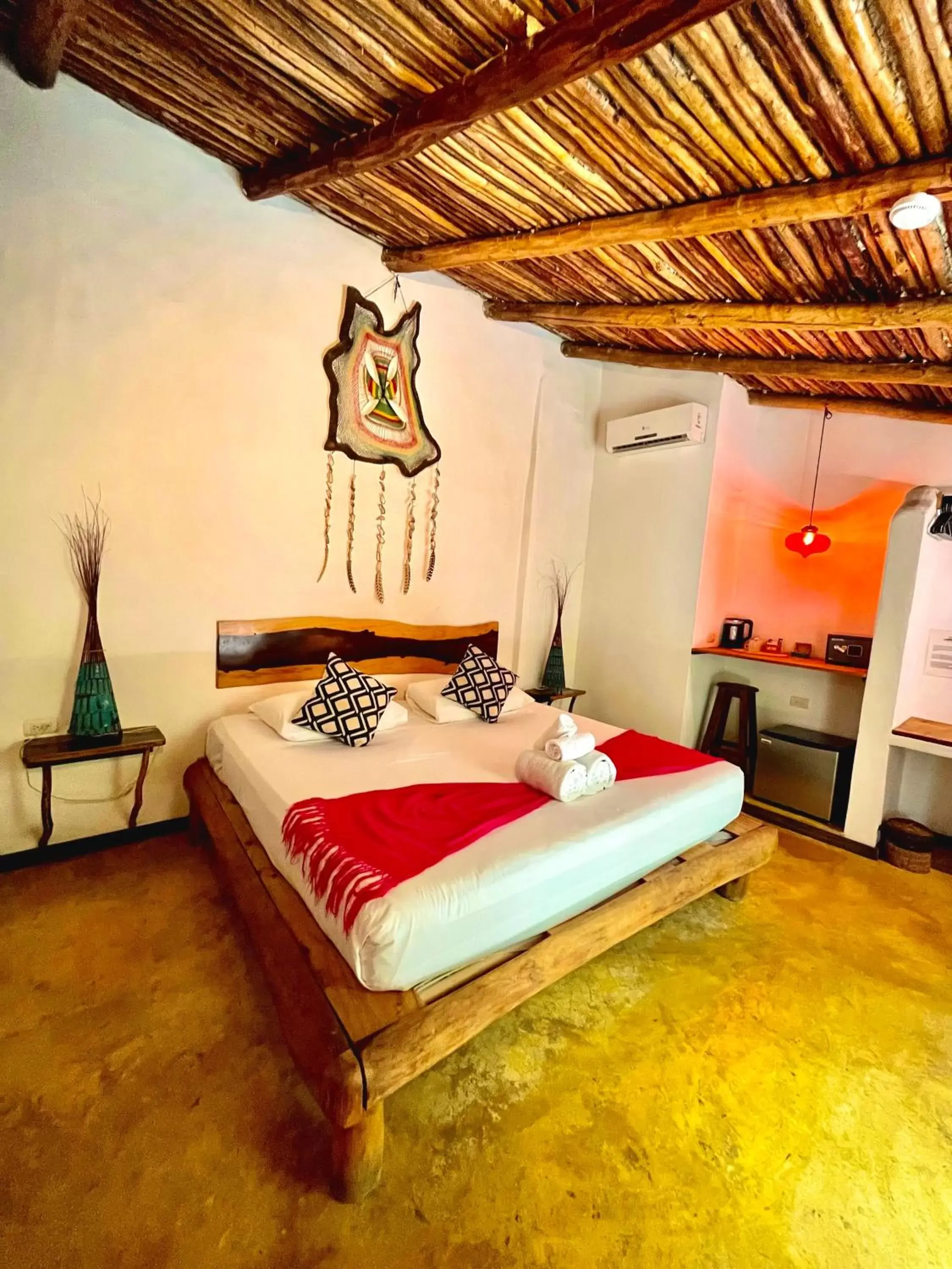 Bed in Pacha Tulum Boutique Hotel