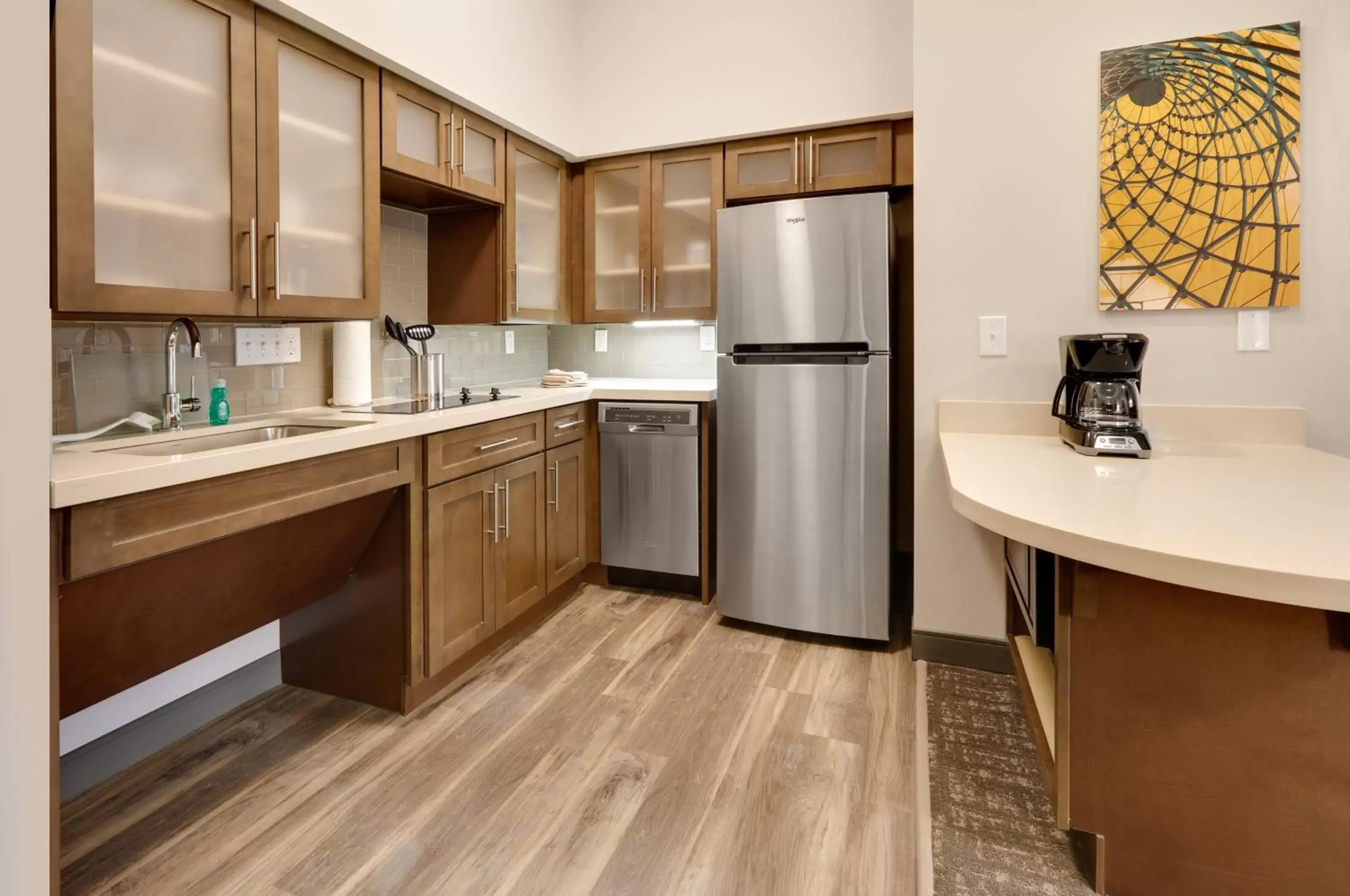 Bedroom, Kitchen/Kitchenette in Staybridge Suites - Oklahoma City - Downtown, an IHG Hotel
