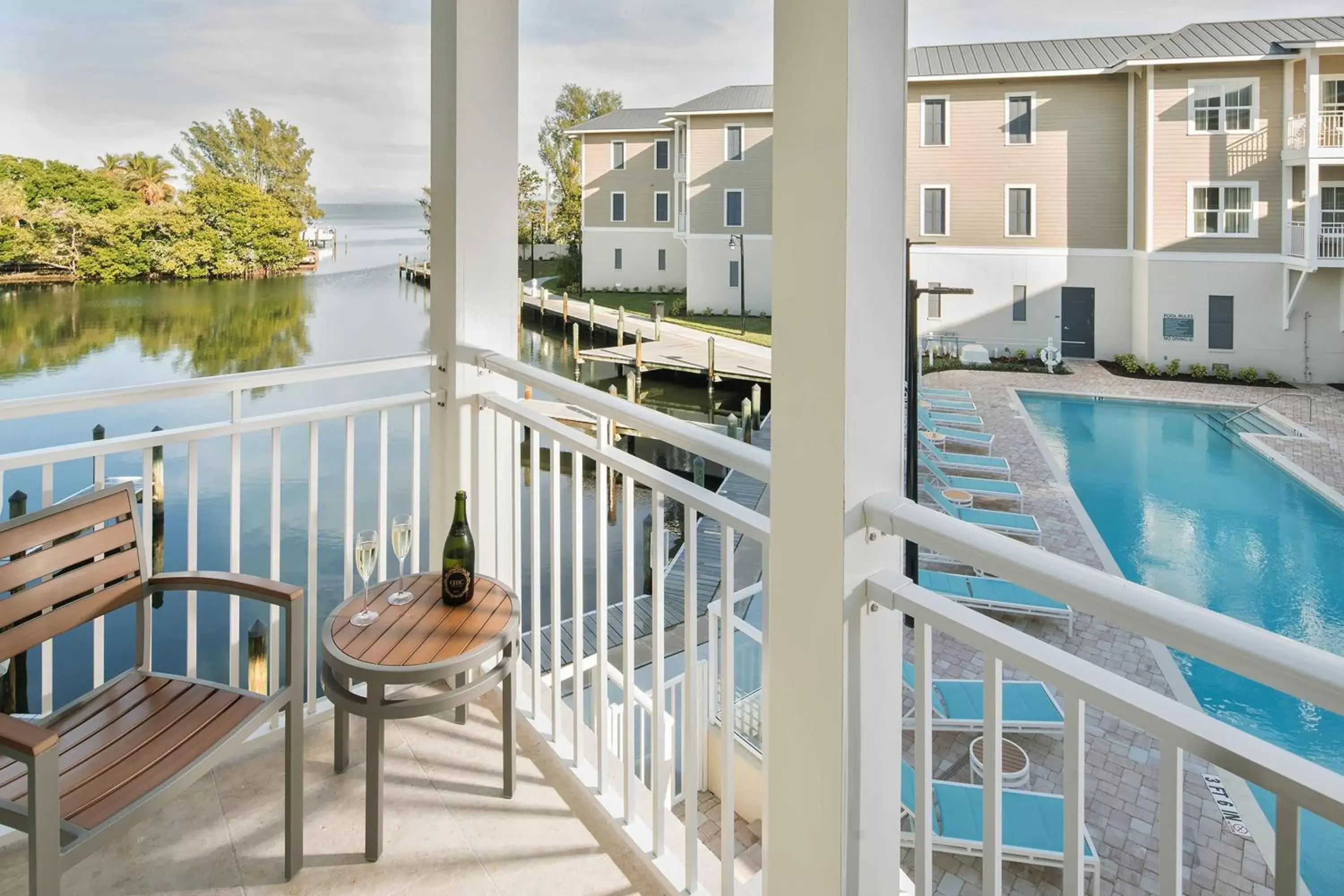 Bedroom, Pool View in Waterline Marina Resort & Beach Club, Autograph Collection