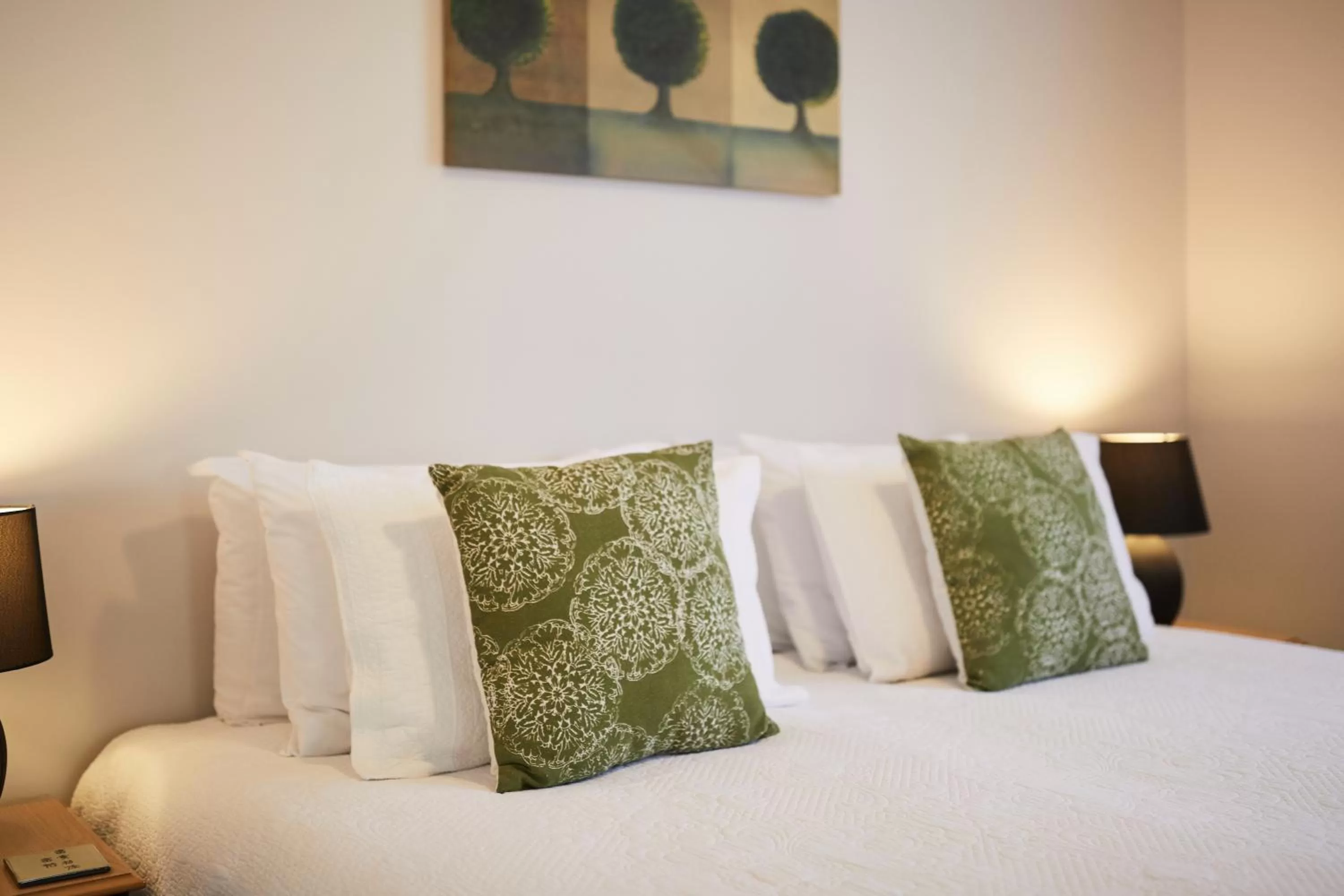 Bed in Blenheim Palms Motel