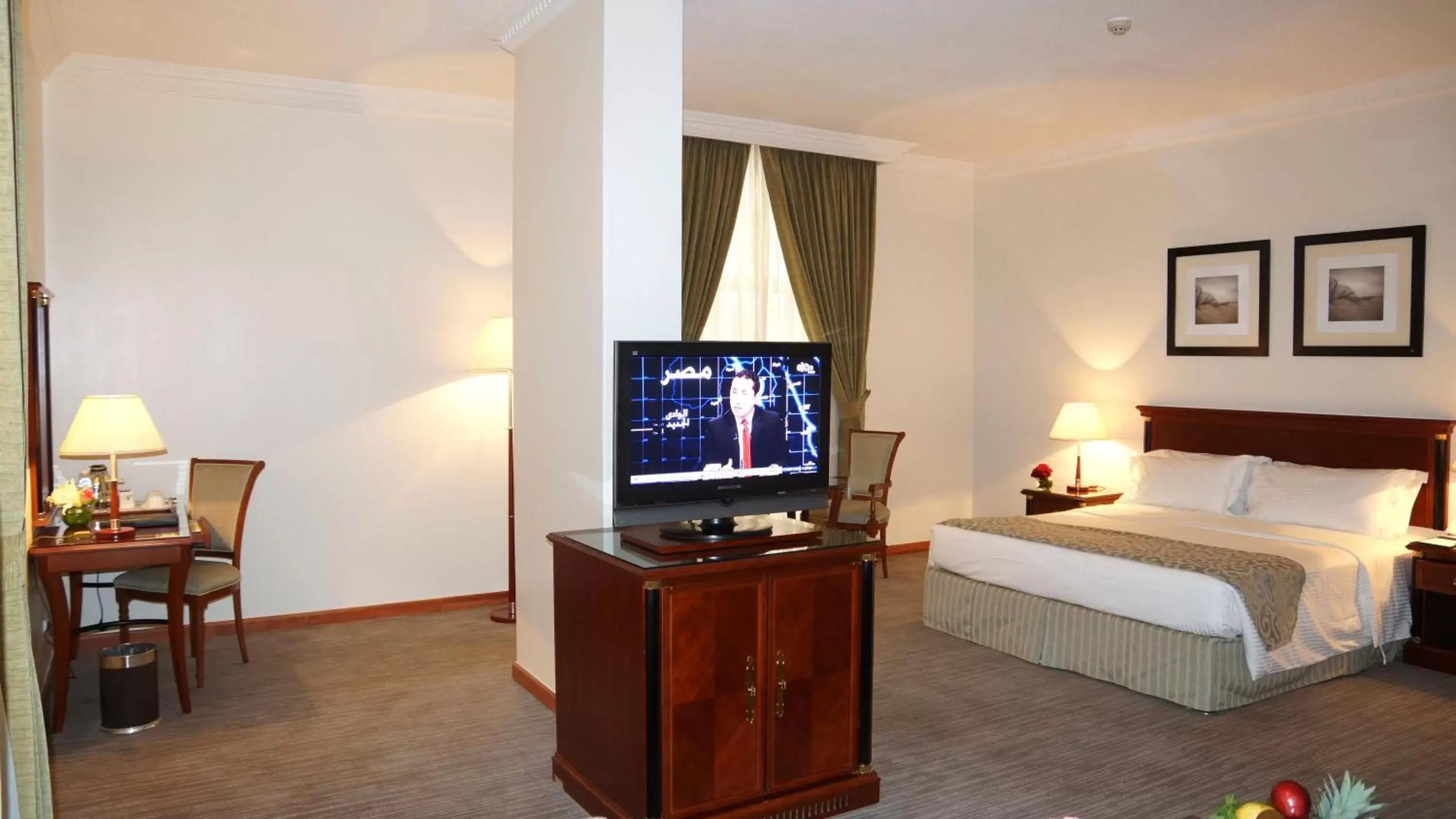 Bed, TV/Entertainment Center in Executives Hotel - Olaya