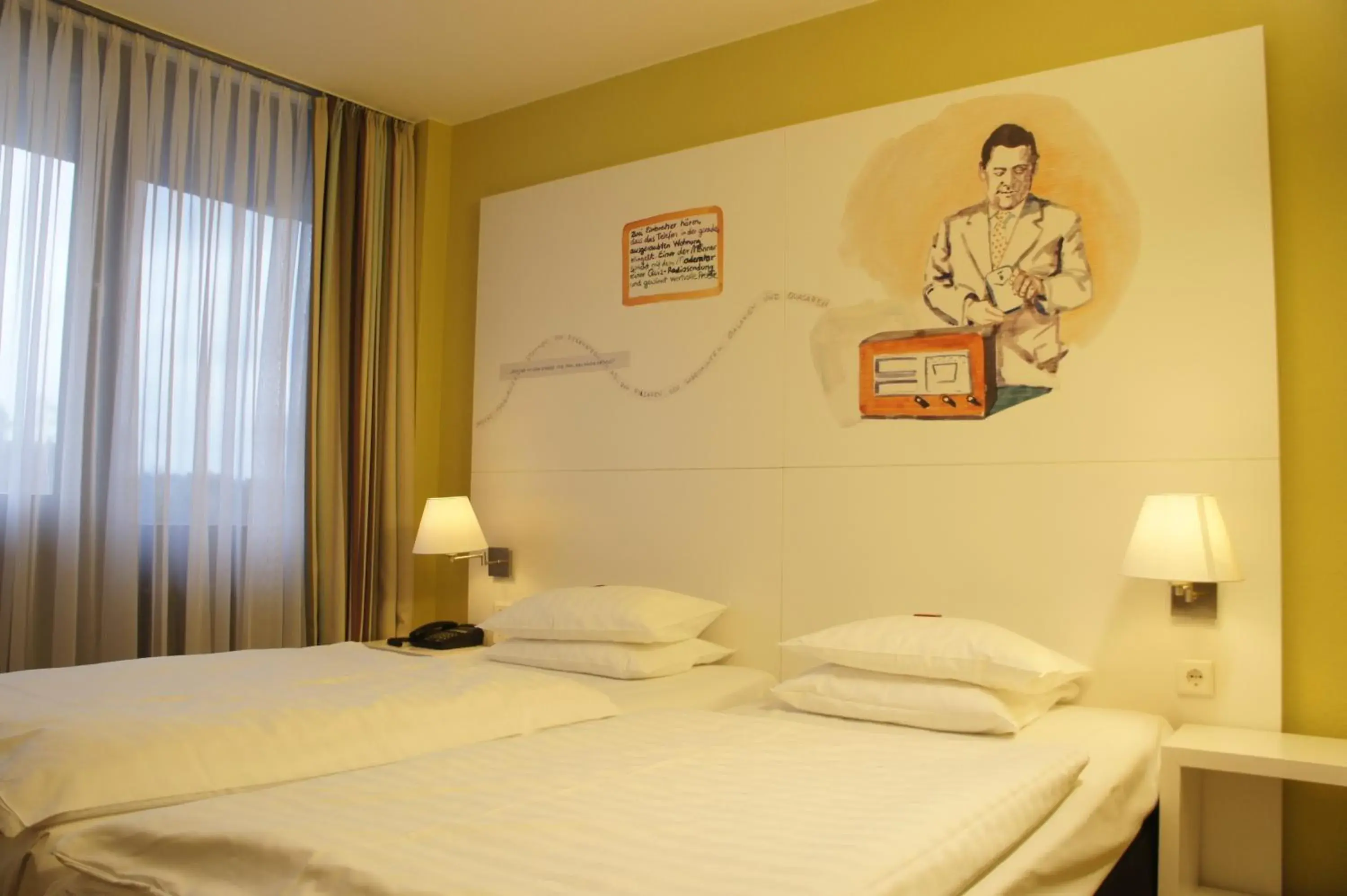 Bed in ARVENA Messe Hotel