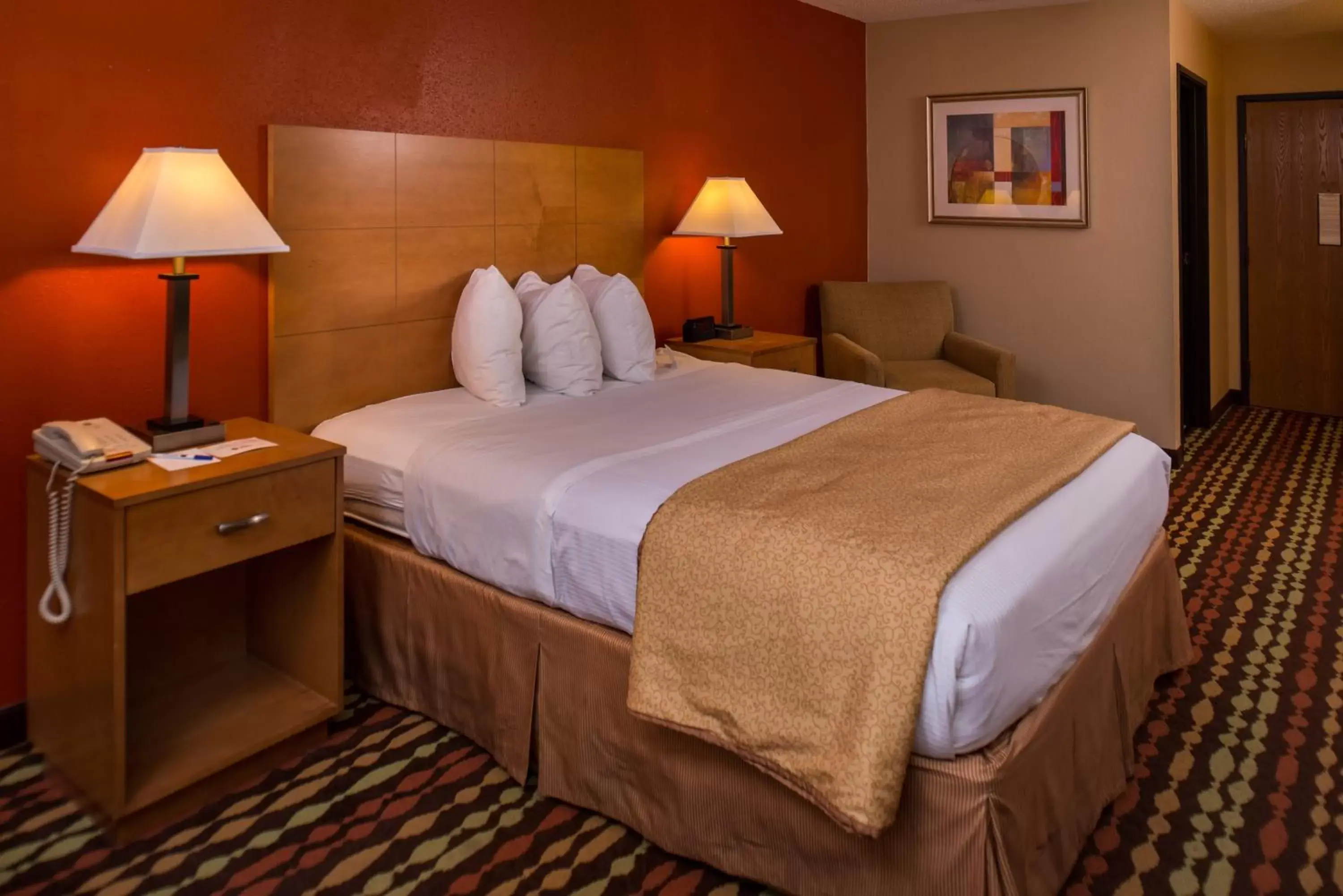 Suite with One King Bed and One Queen Bed in Best Western Ambassador Inn & Suites