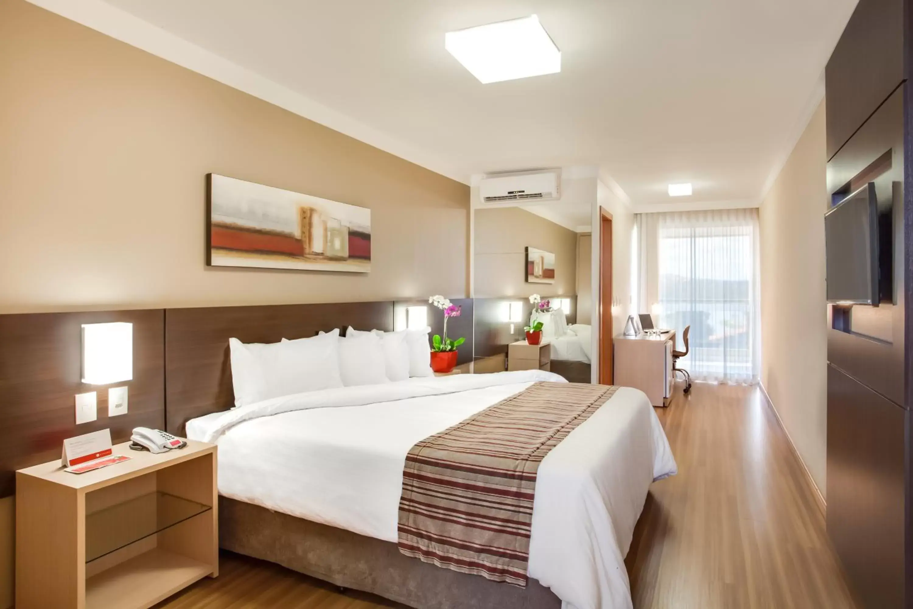 Bed in Ramada Hotel & Suites Lagoa Santa By Wyndham