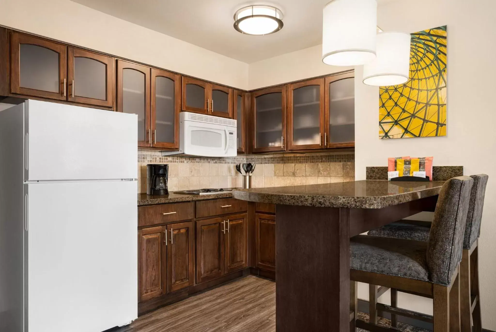 Photo of the whole room, Kitchen/Kitchenette in Staybridge Suites Oklahoma City-Quail Springs, an IHG Hotel