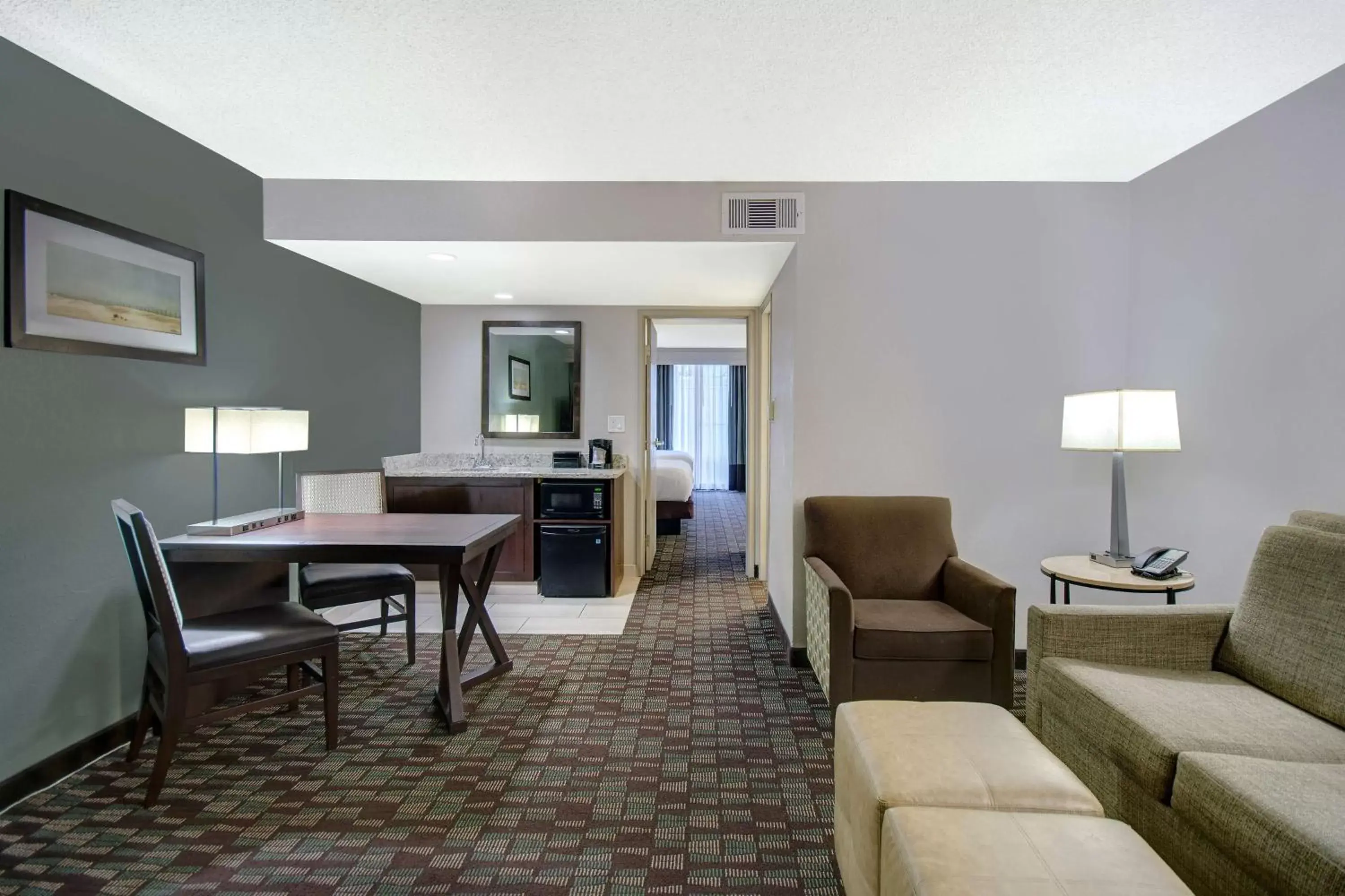 Living room, Seating Area in Embassy Suites by Hilton Jacksonville Baymeadows