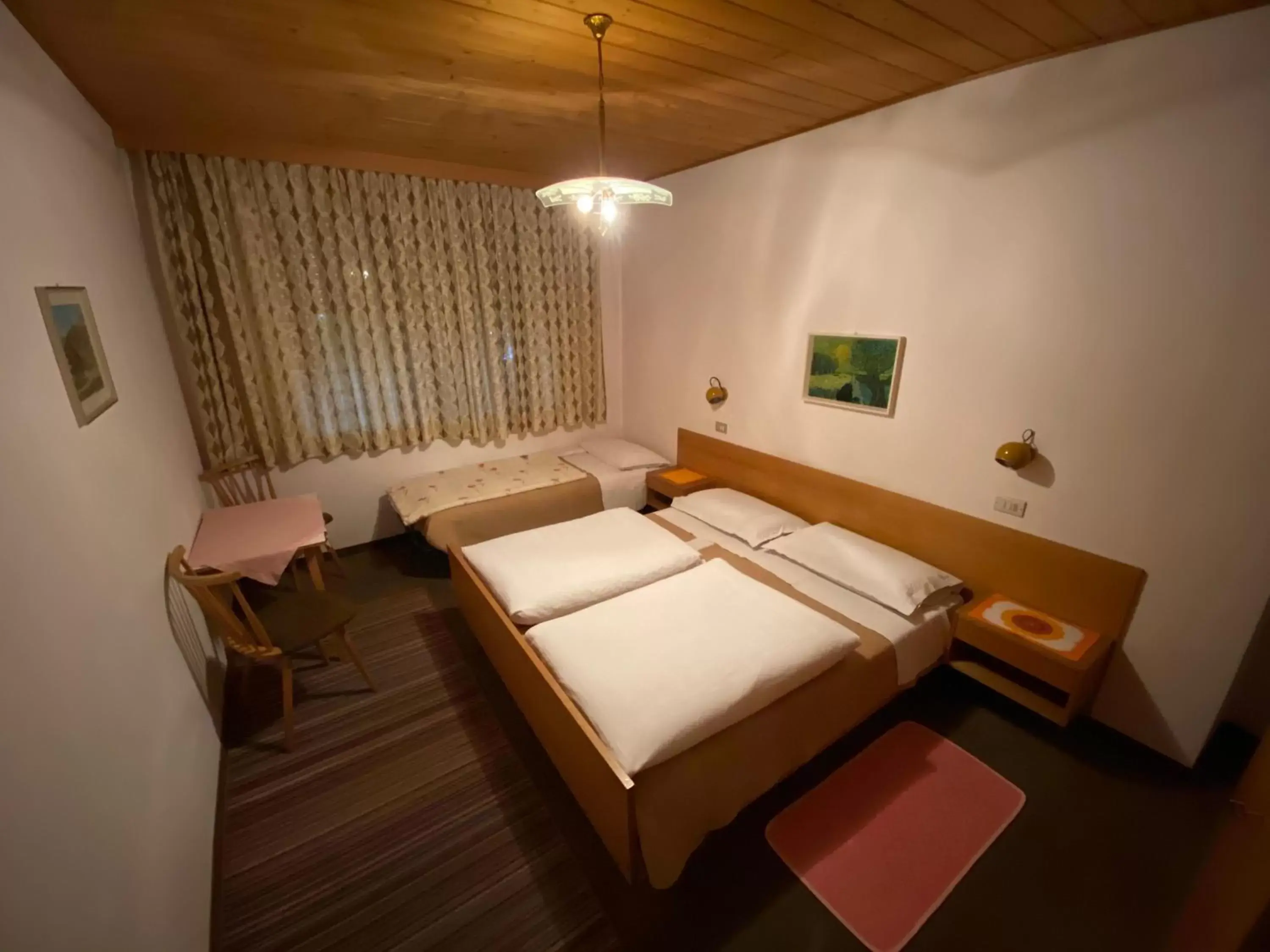 Photo of the whole room, Bed in Gasthof Albergo Ressmair