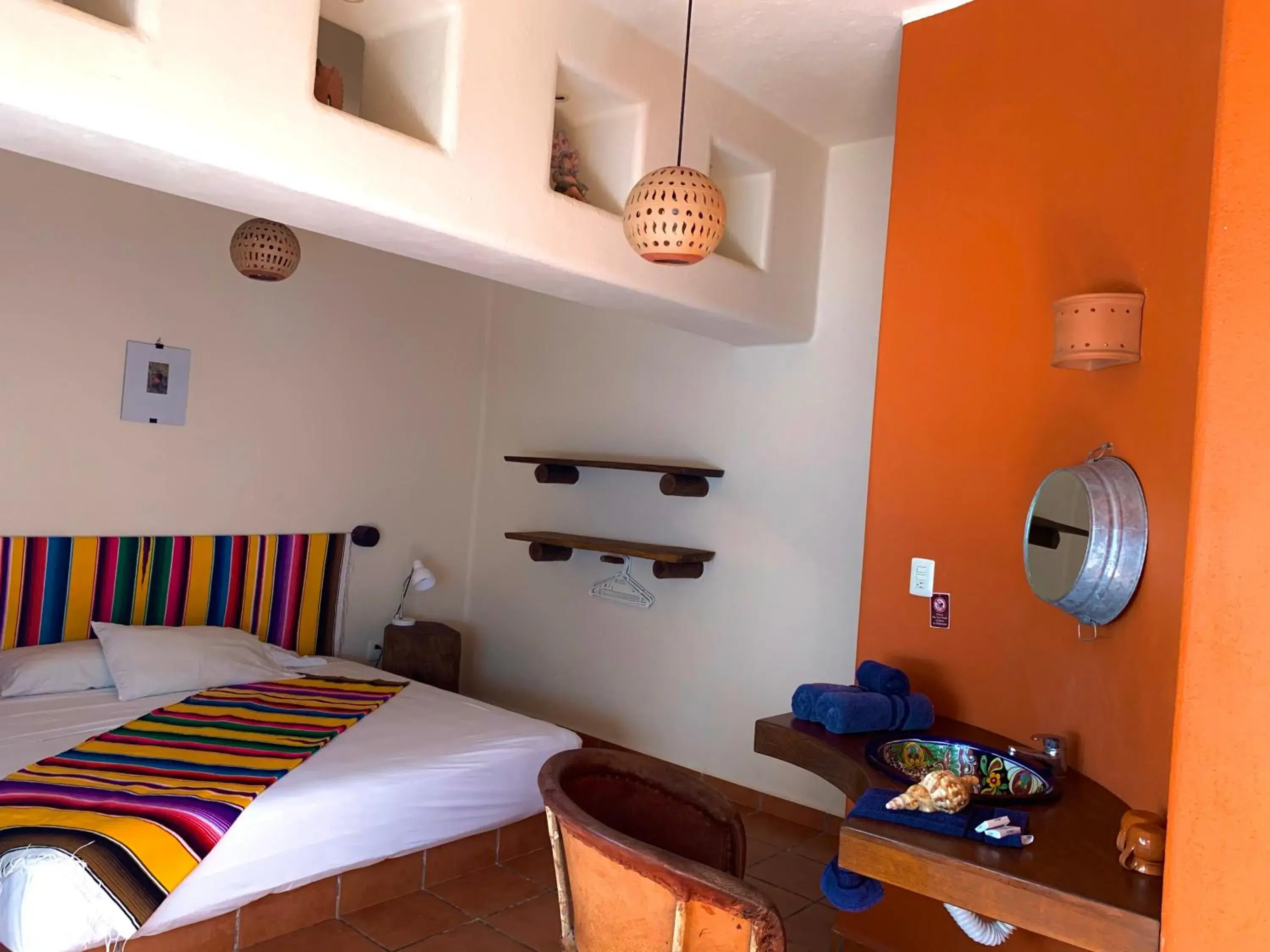 Bed in Lo Nuestro Petit Hotel Tulum