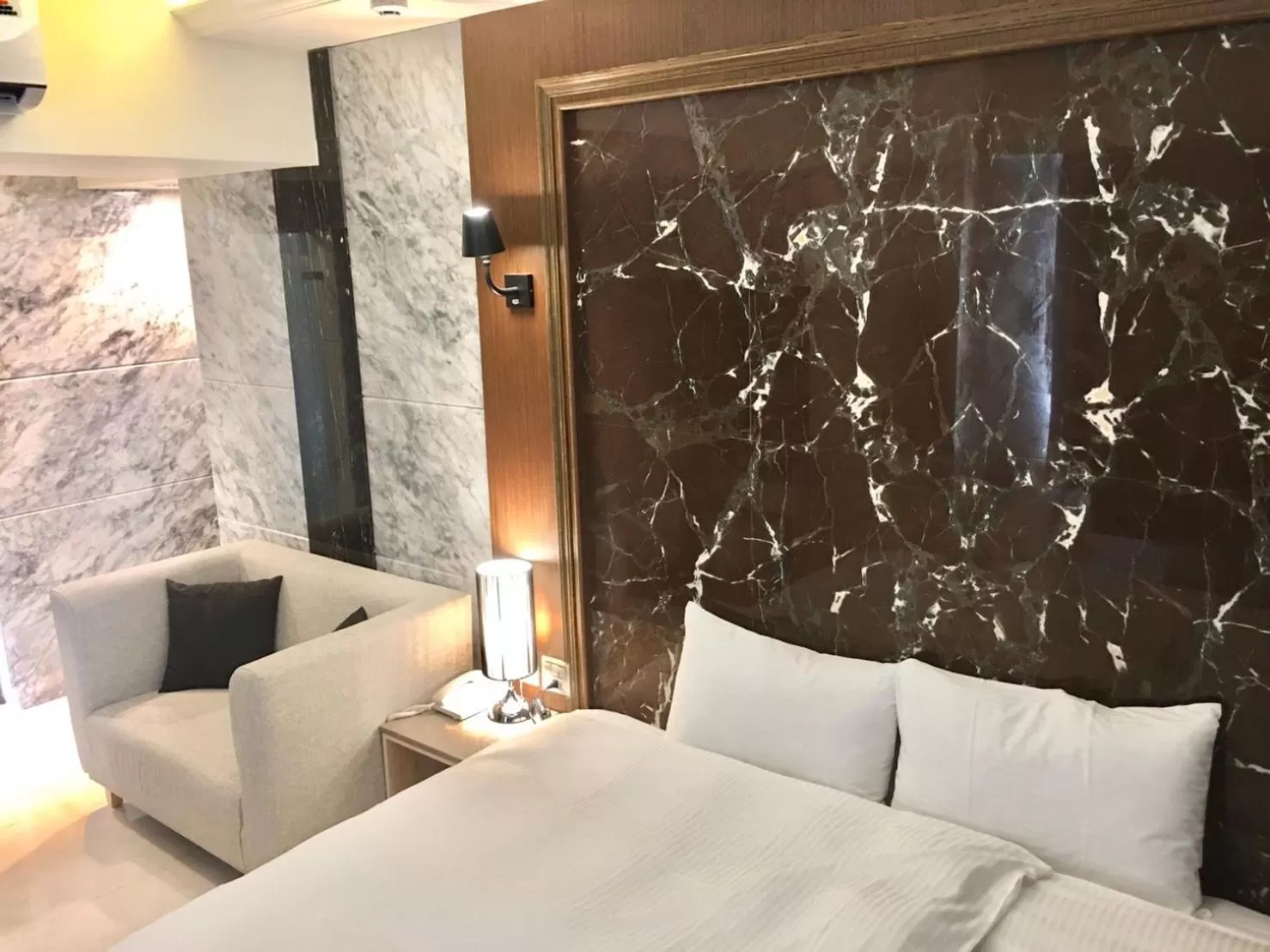 Bed in Hotel Maple Taiwan Boulevard