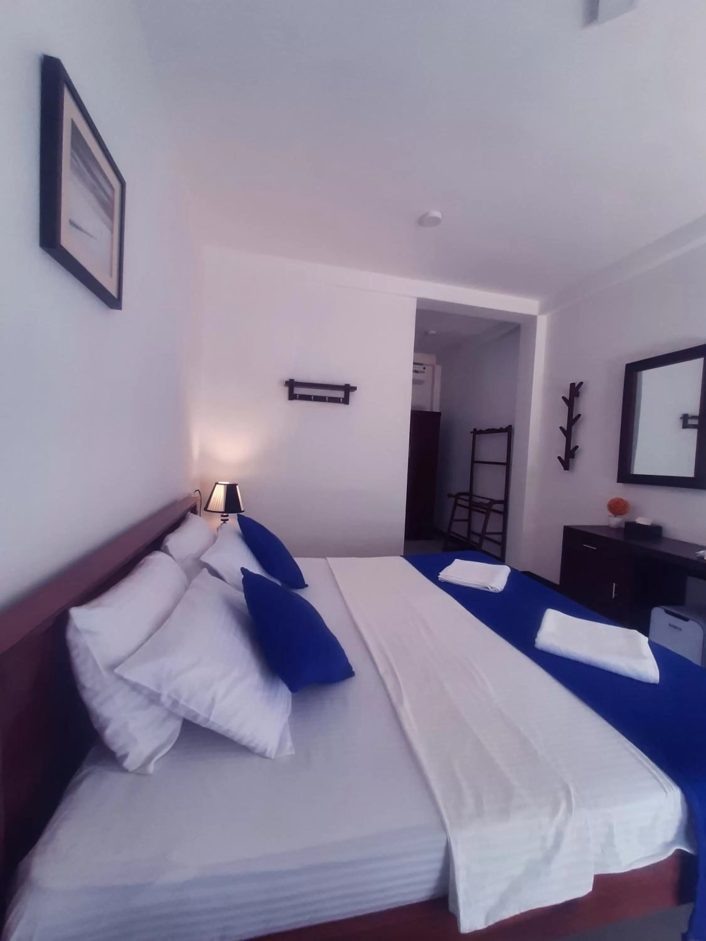 Bed in Mirissa Blue Whale Holiday Hotel