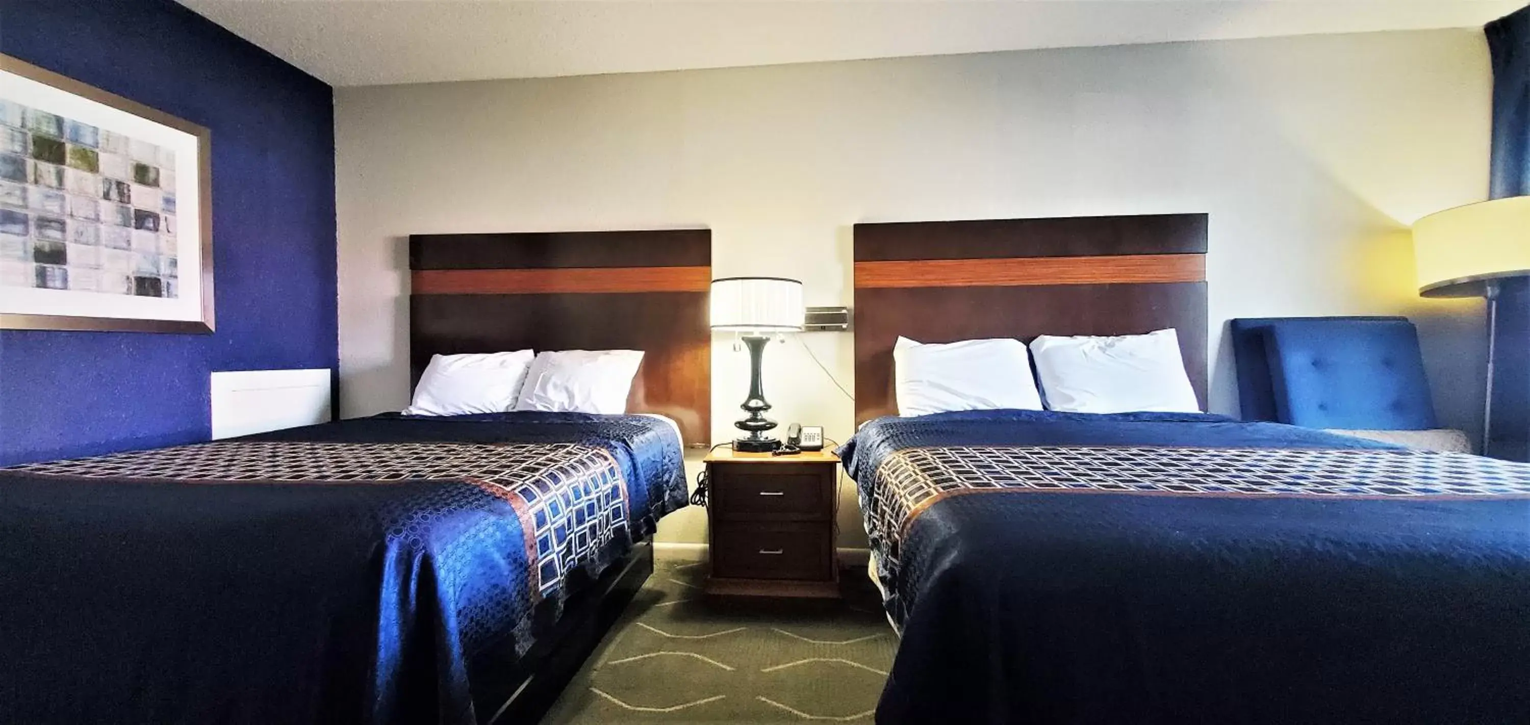 Bedroom, Bed in Economy 7 Inn- Newport News