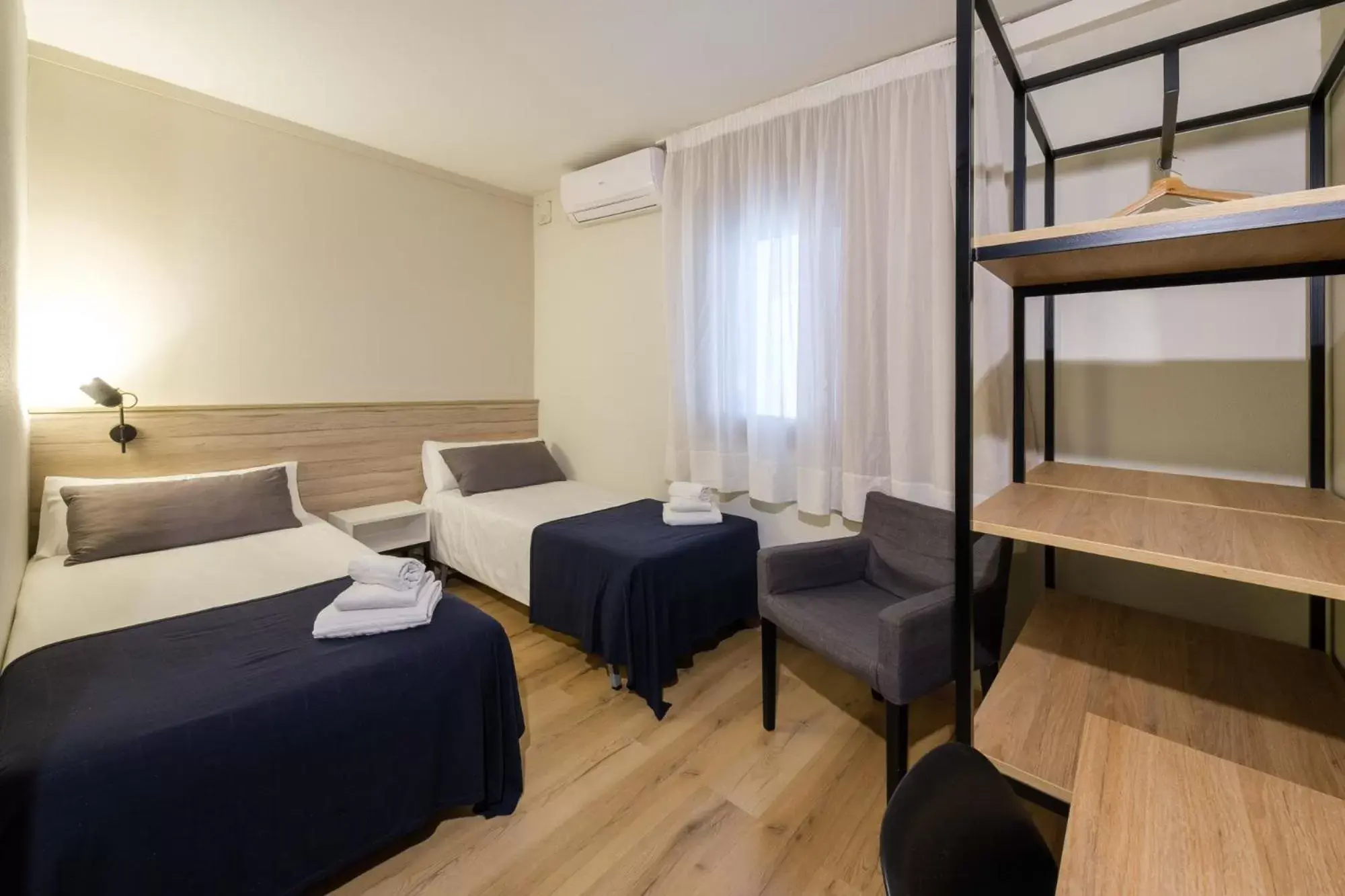 Bed in Hotel Torres Manlleu