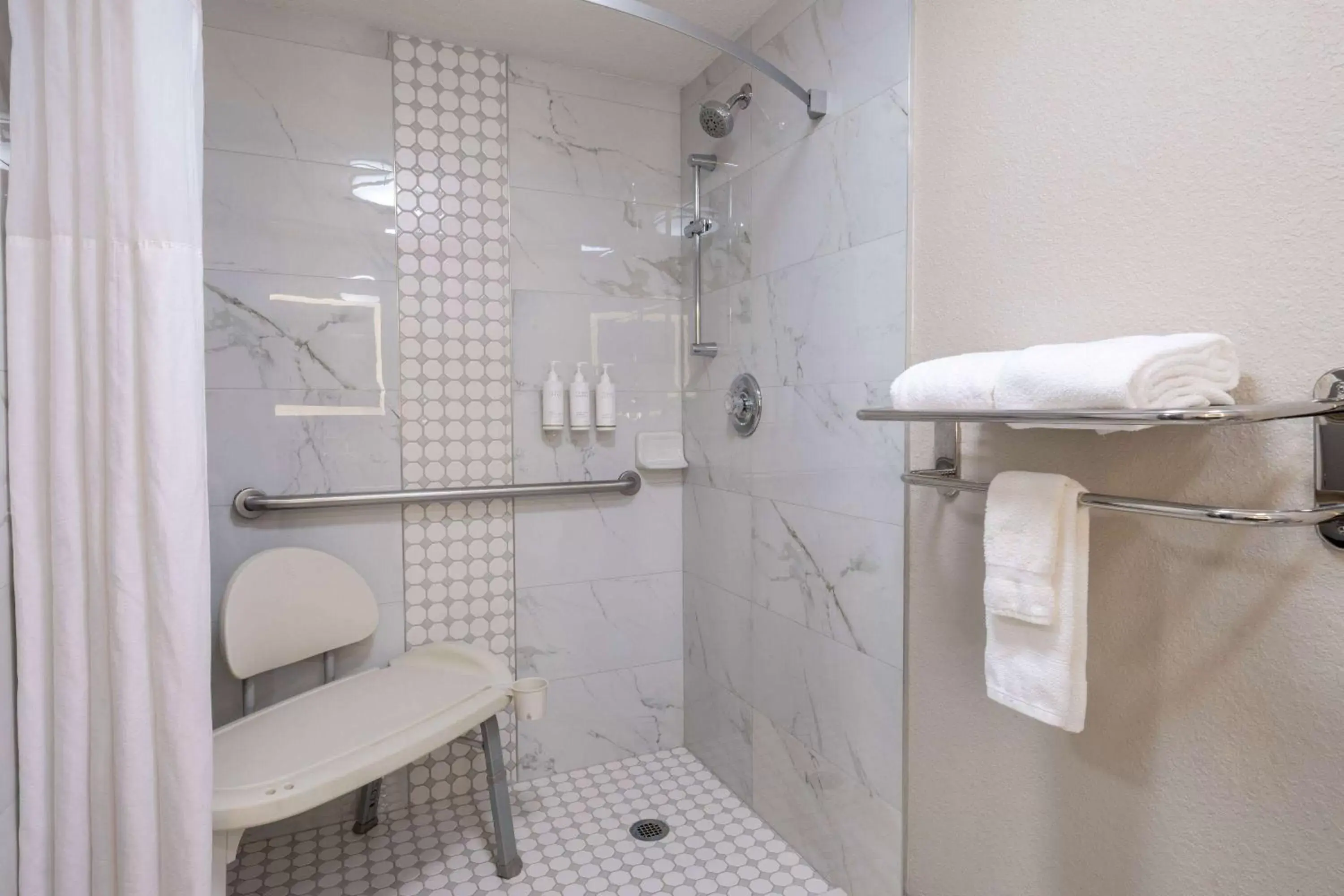Shower, Bathroom in Days Inn & Suites by Wyndham Commerce