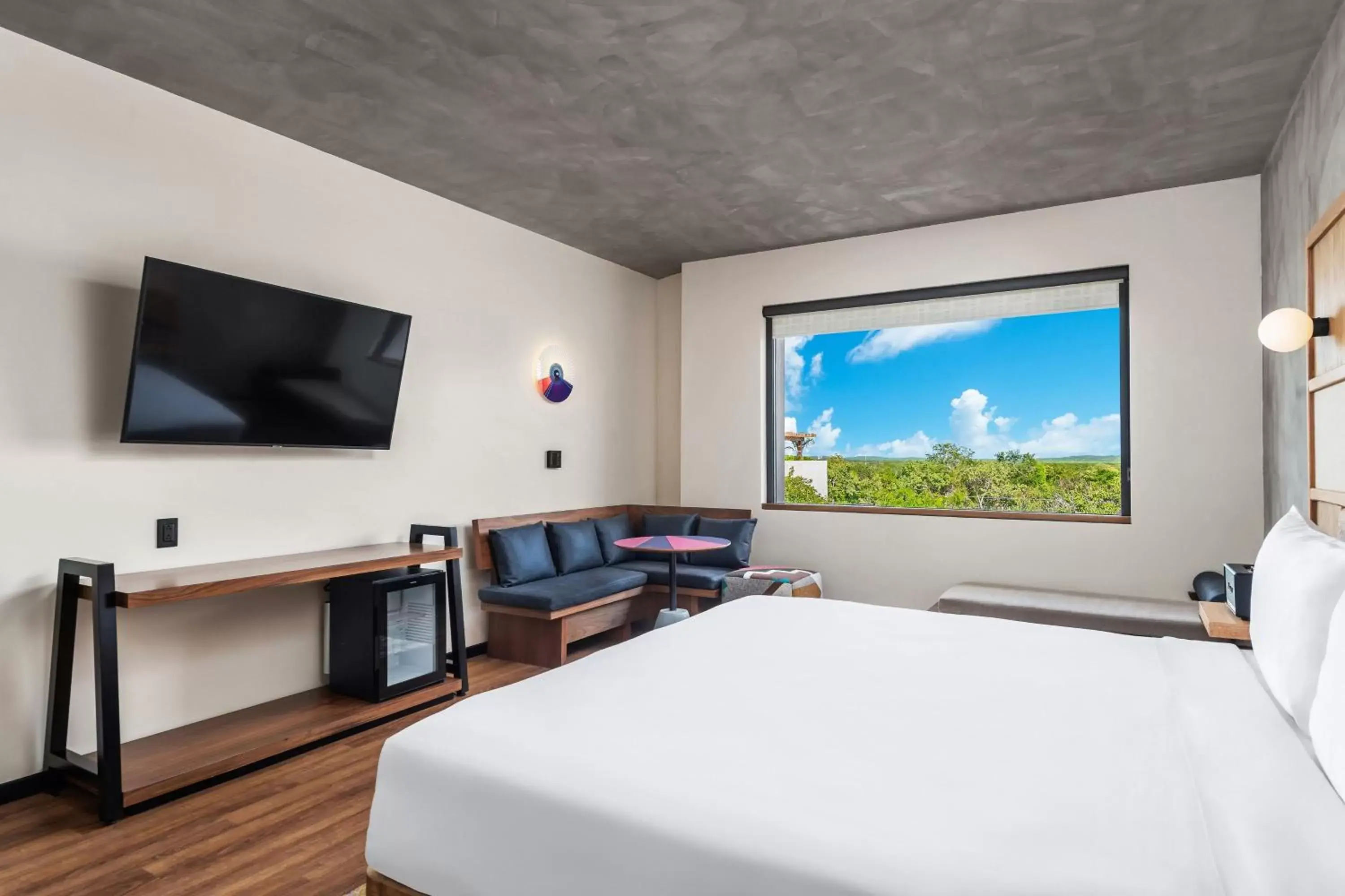 Photo of the whole room, Bed in Aloft Tulum