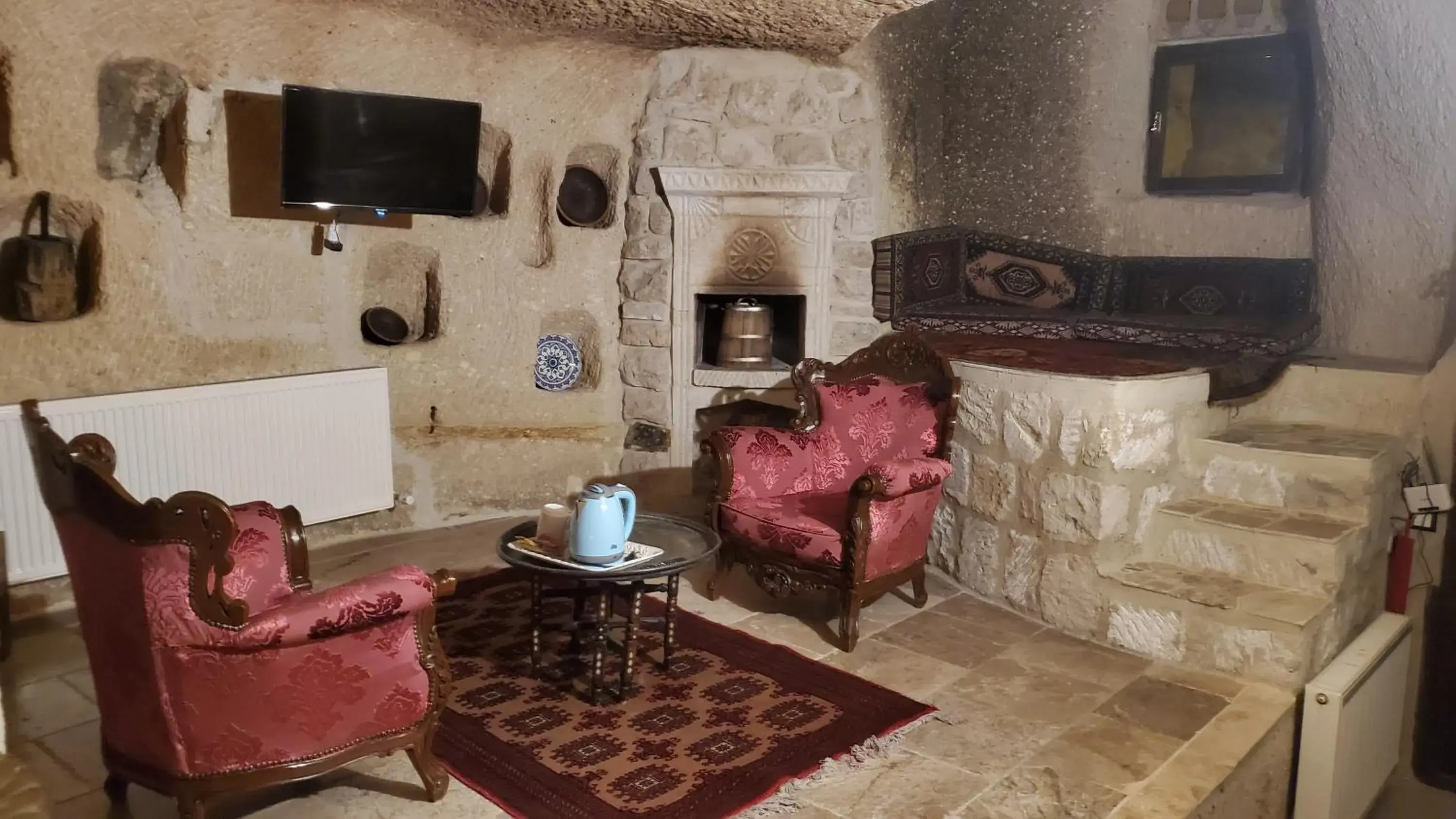 Seating Area in Antique Terrace Cave Suites