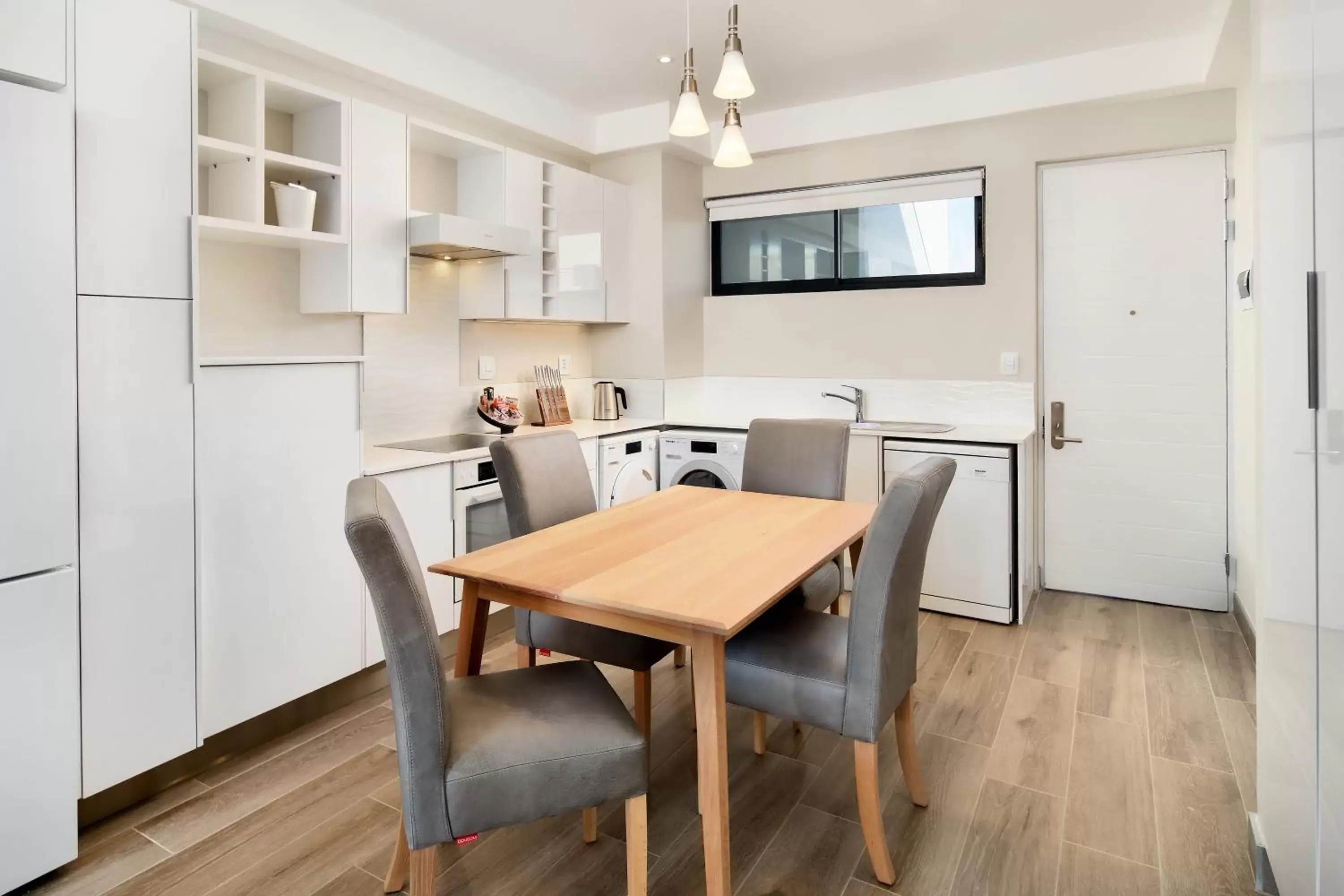 Kitchen or kitchenette, Dining Area in The Regency Apartment Hotel Menlyn