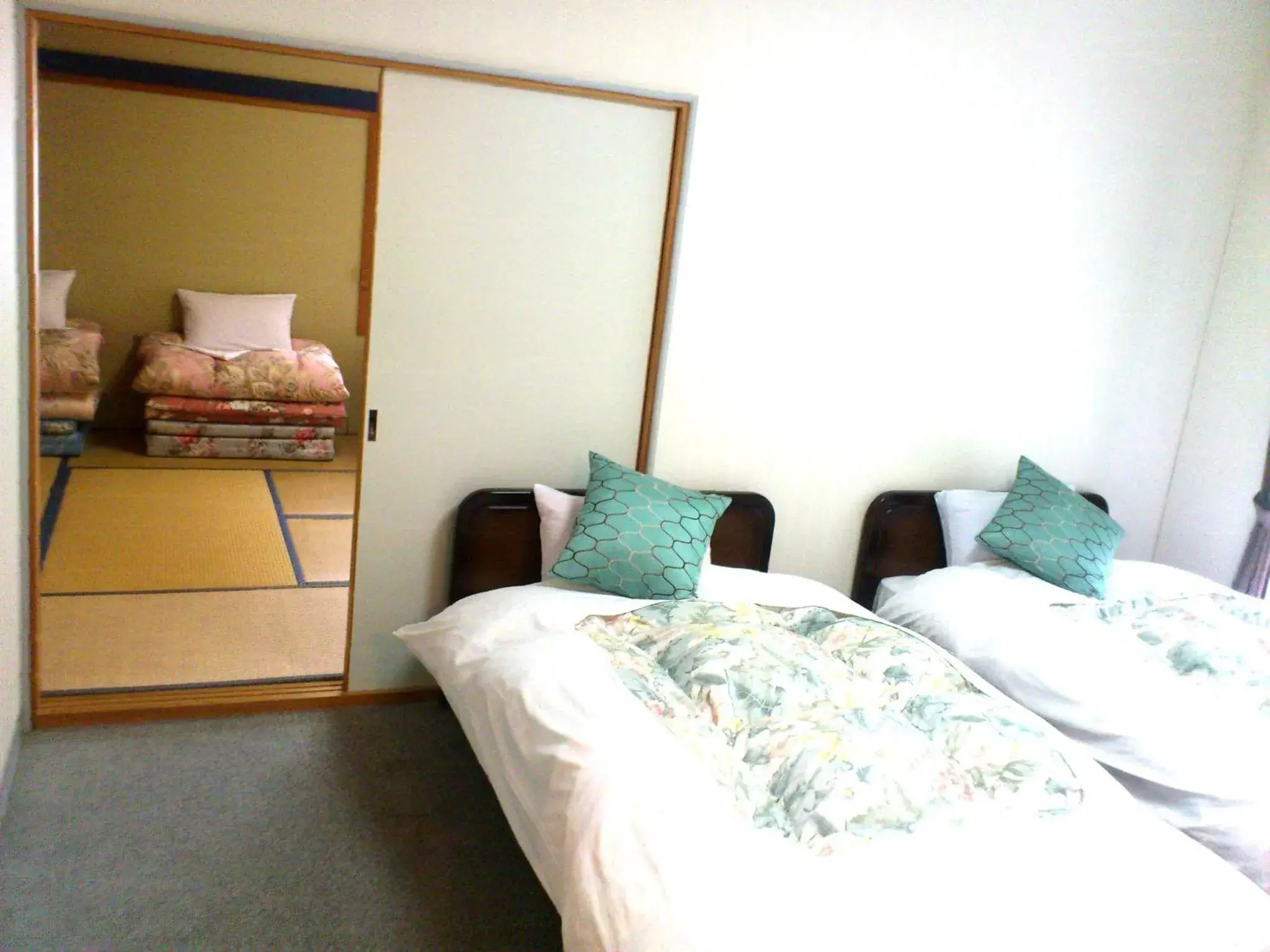 Bed in Tenjin Lodge