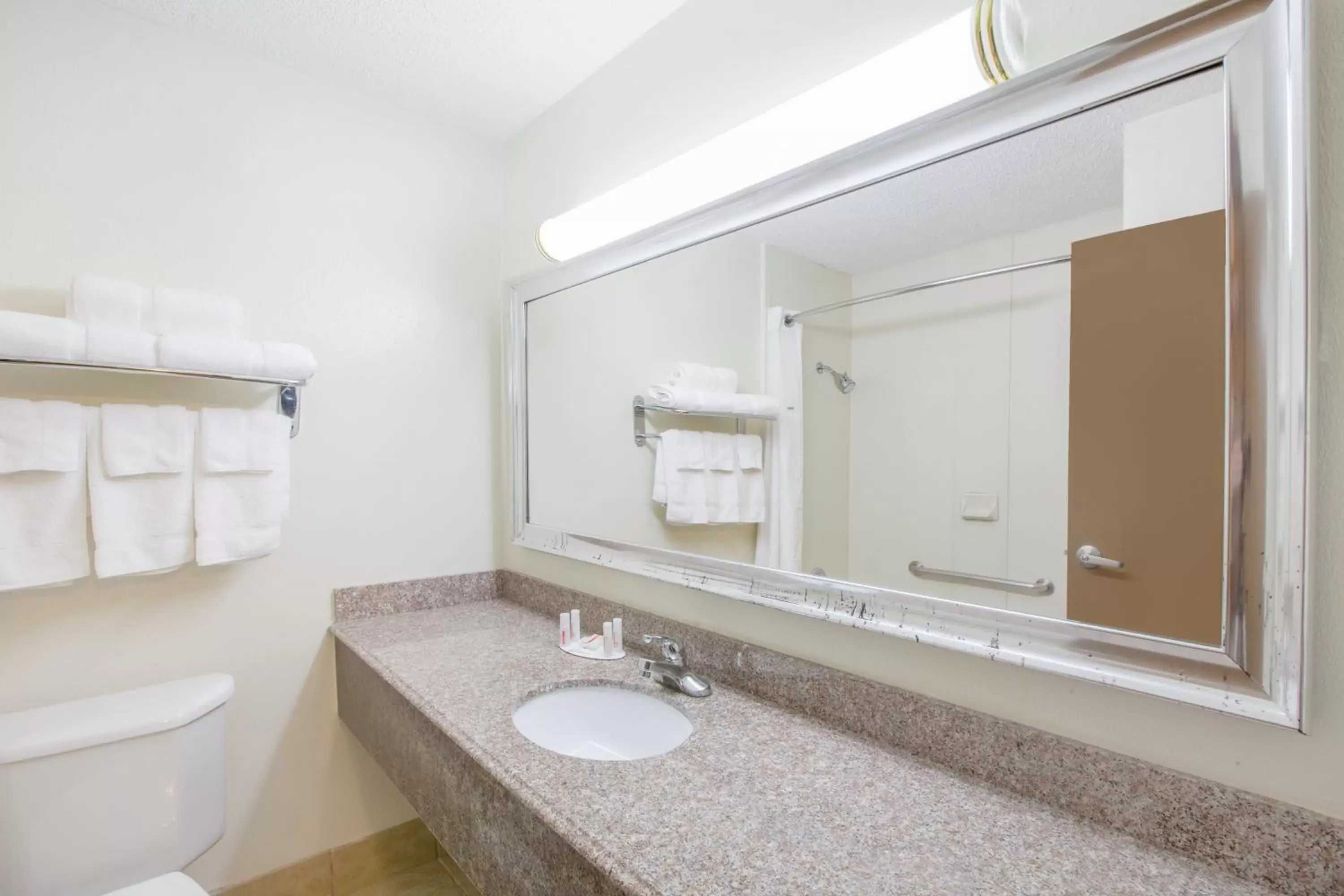 Bathroom in Ramada by Wyndham Tulsa