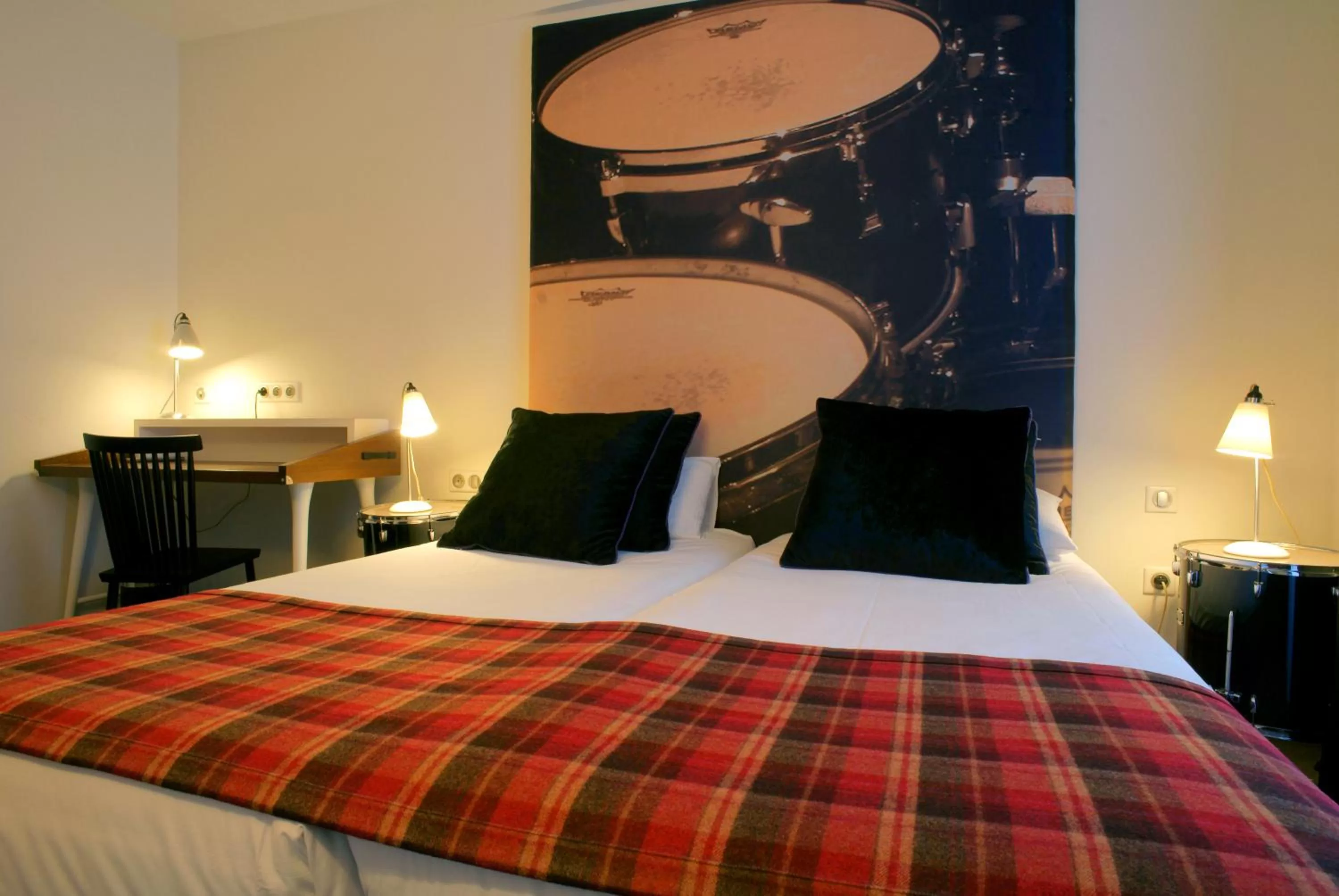 Bed in Hôtel du Triangle d'Or