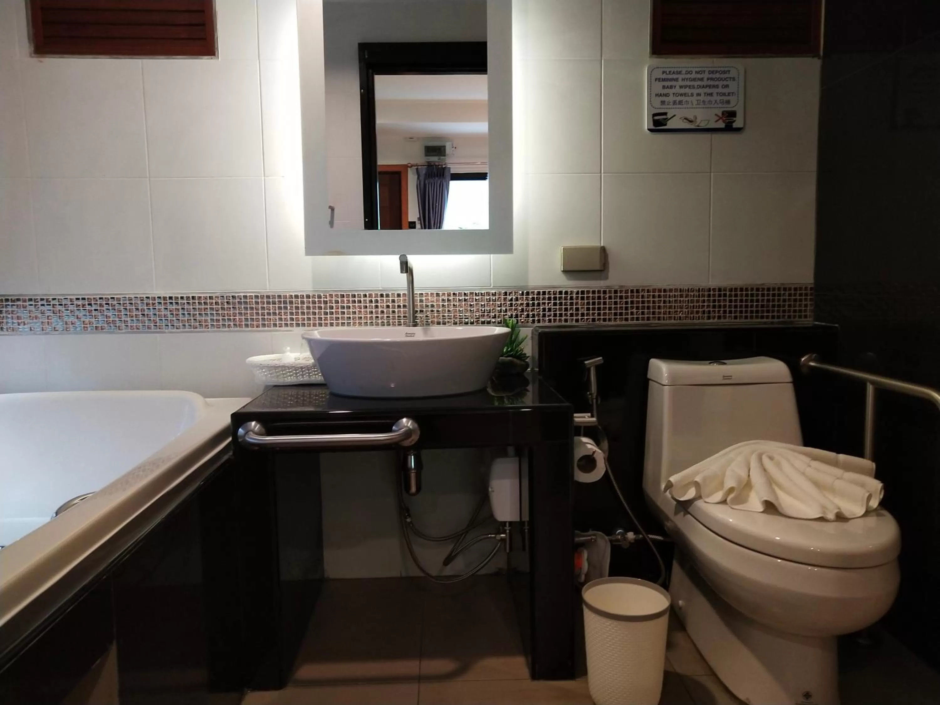 Toilet in Hotel De Wualai