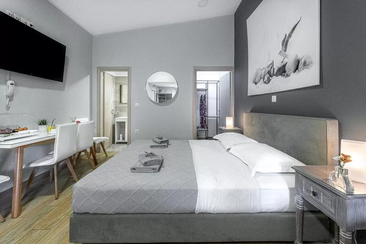 Photo of the whole room, Bed in Comfort Stay Athens Airport Hotel - FREE shuttle from and to the airport