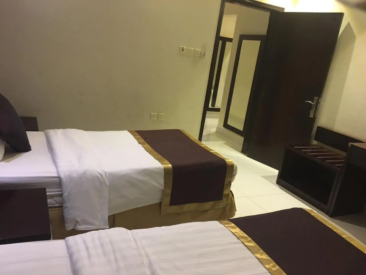 Bed in Taleen Al Nakheel Apartment