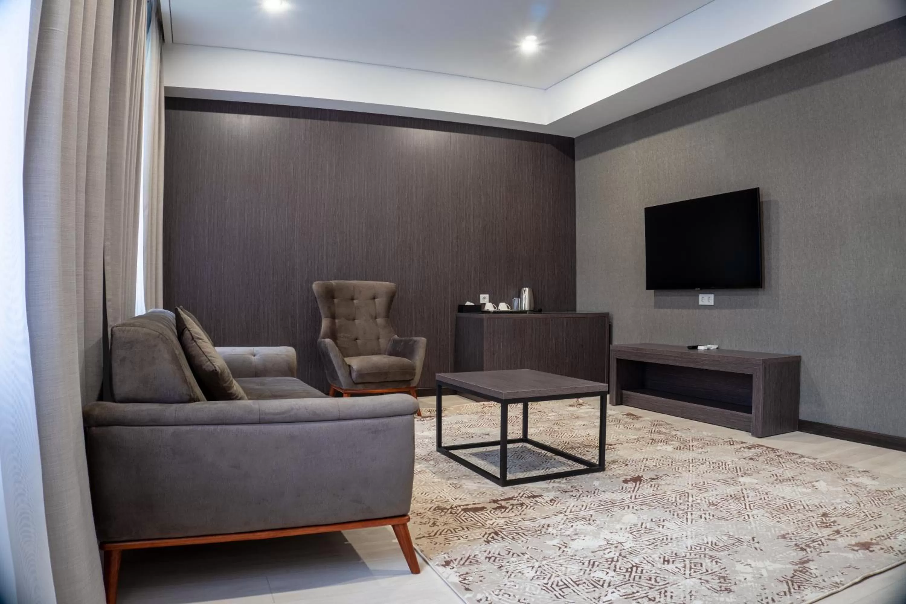 TV and multimedia, Seating Area in Resident Hotel Kazybek Bi