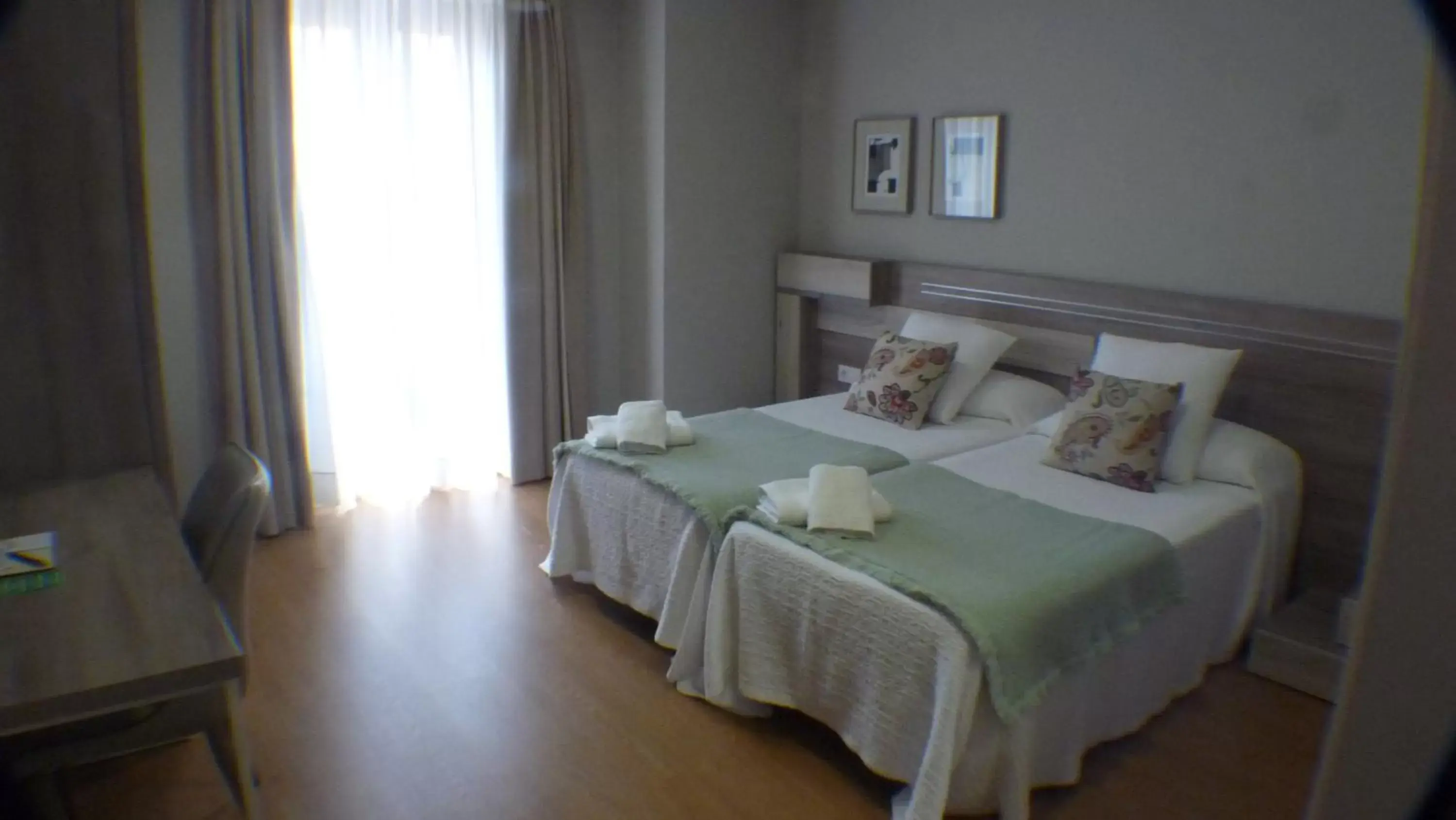 Photo of the whole room, Bed in Hotel Roquiño