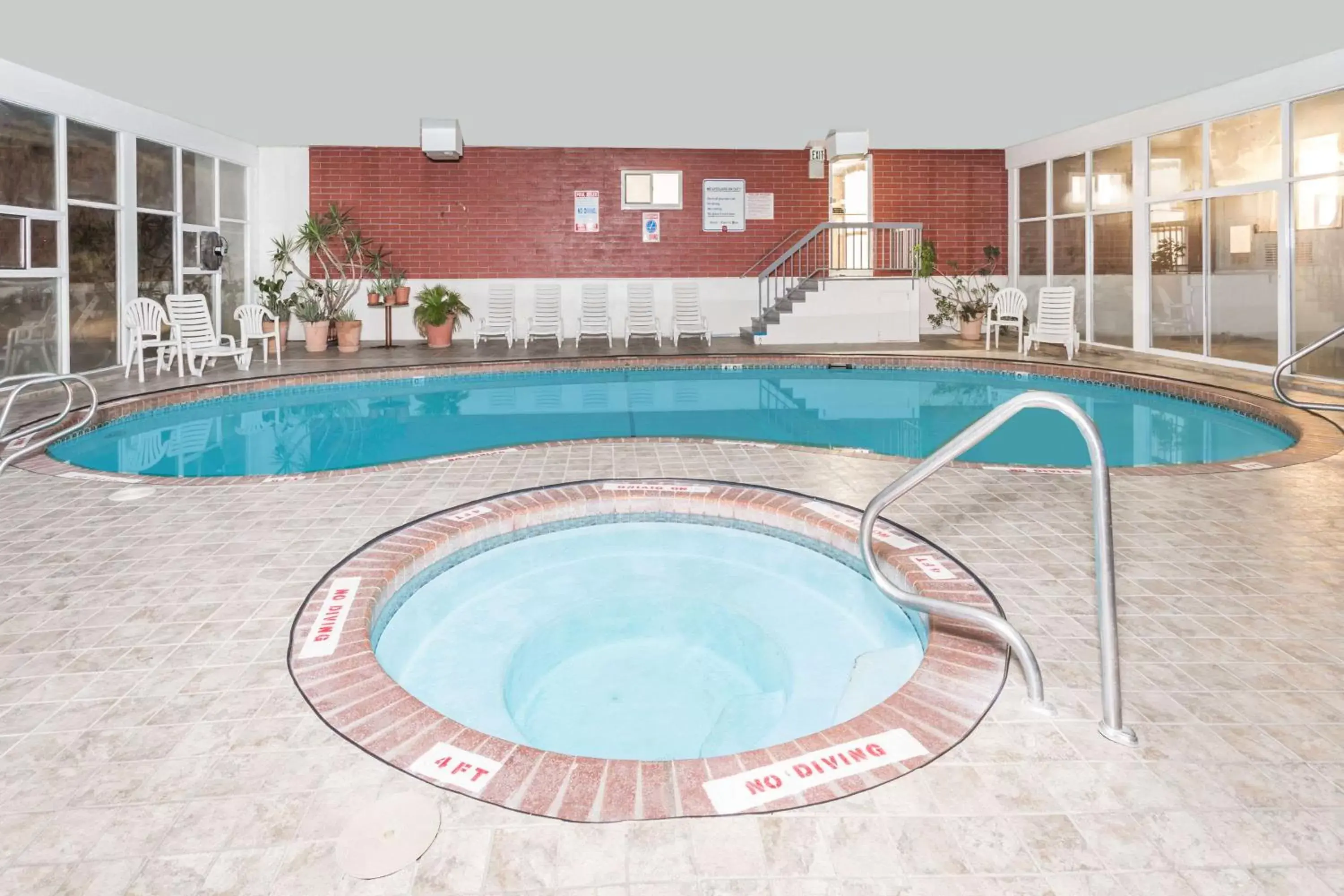 On site, Swimming Pool in Days Inn by Wyndham Evanston WY