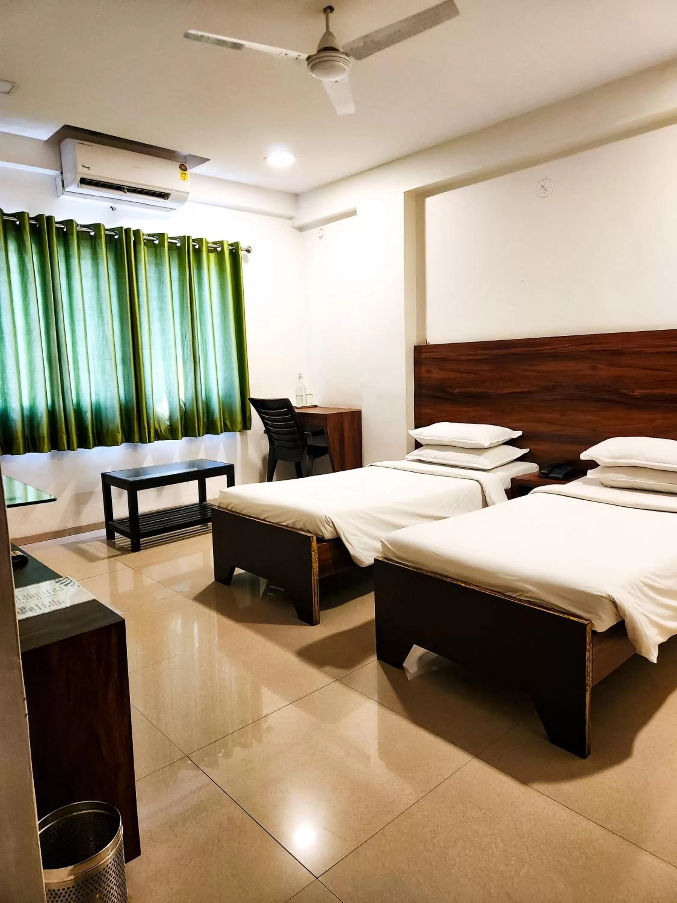 Bed in Hotel Rajwada Aurangabad