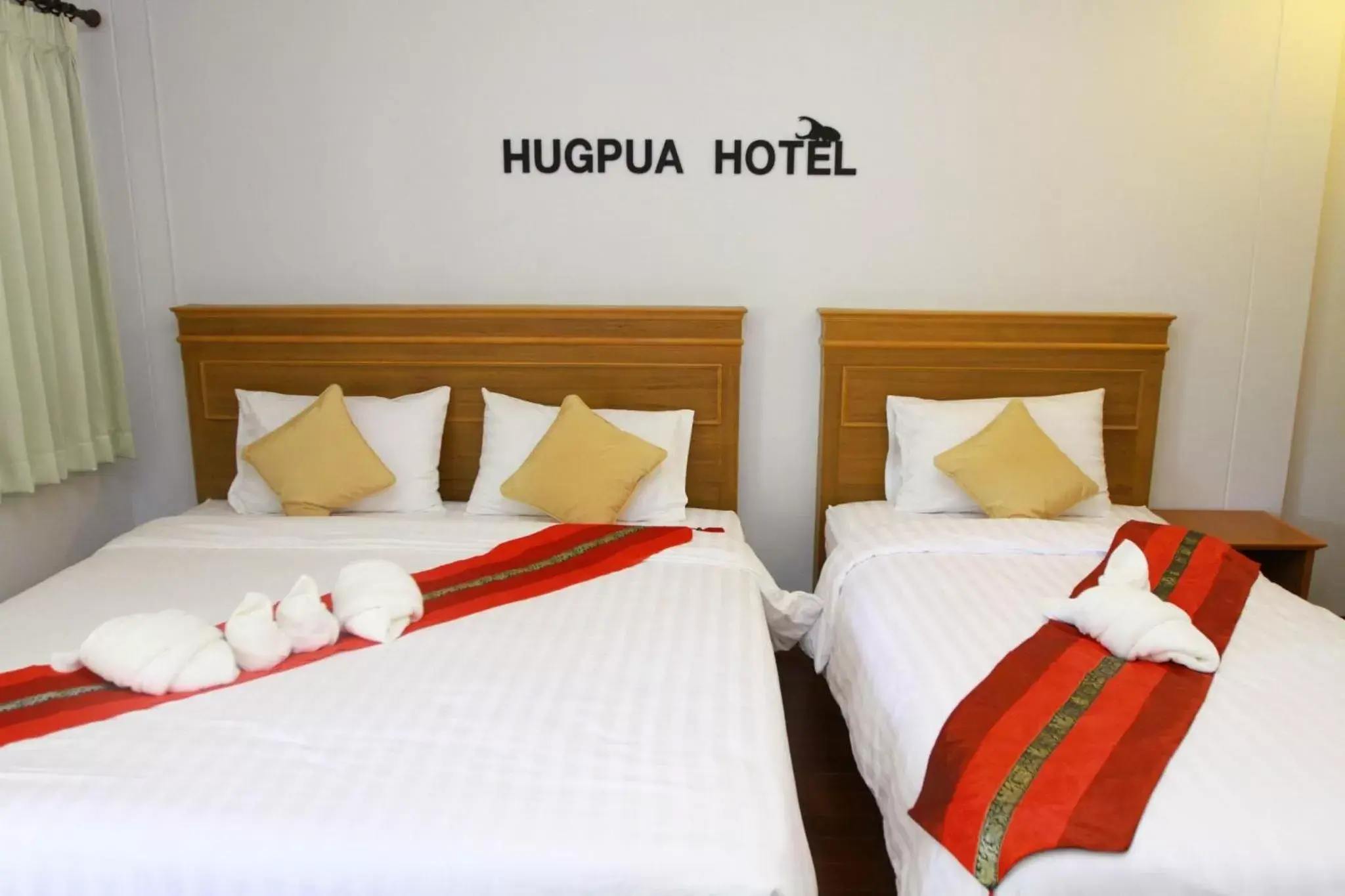 Bed in Hugpua Hotel