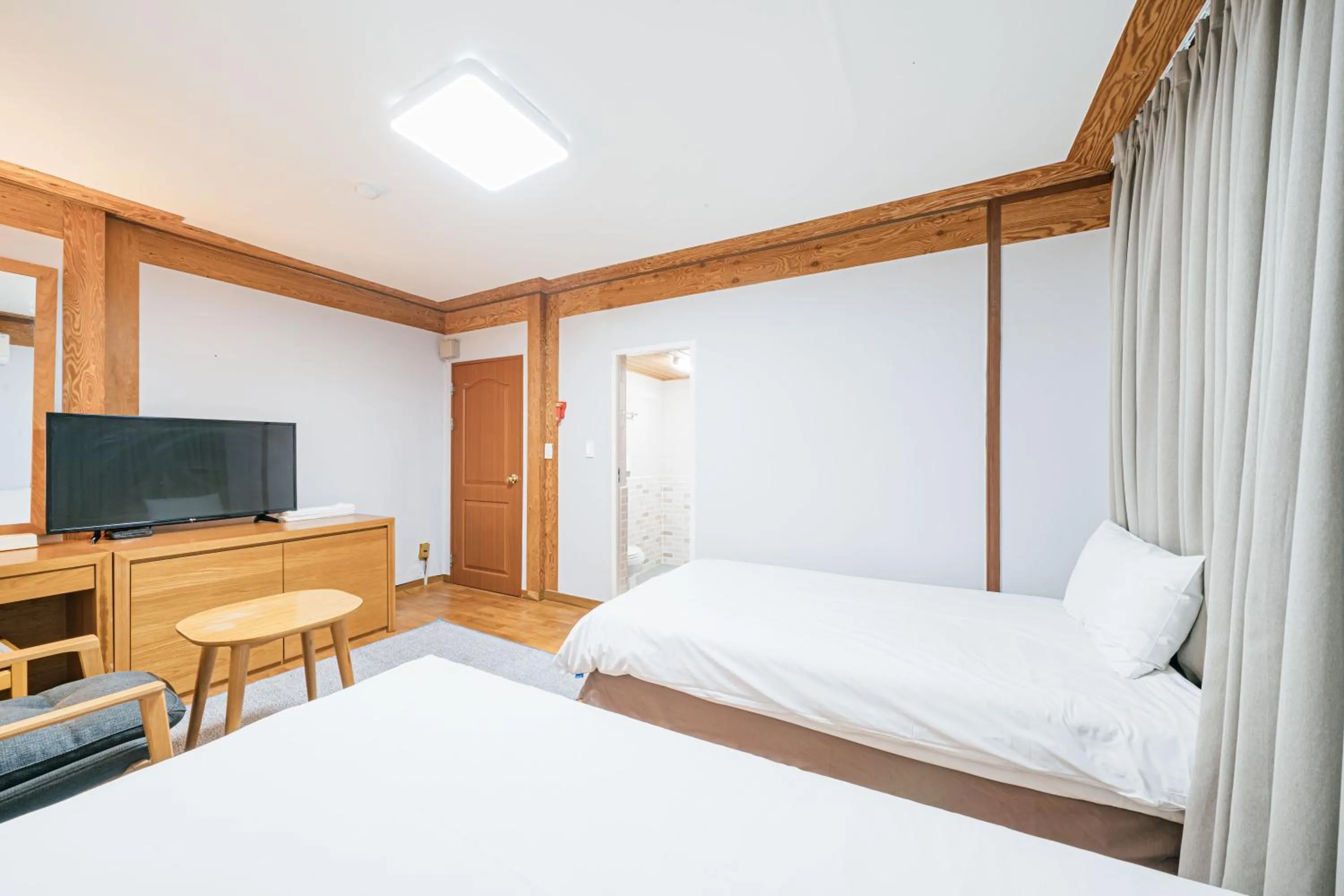 Bed in Jeju Miracle Hotel