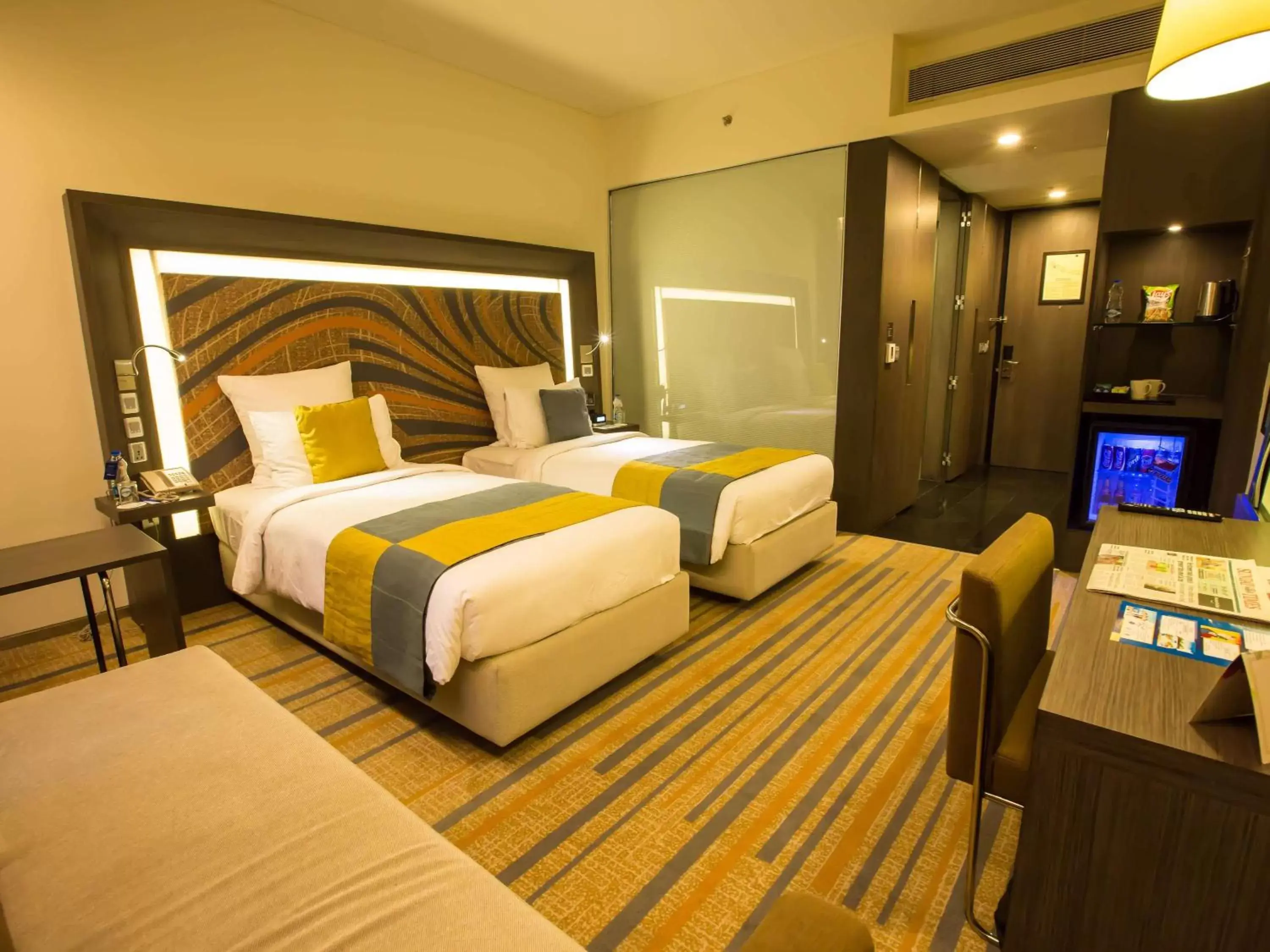 Photo of the whole room, Bed in Novotel Kolkata Hotel and Residences