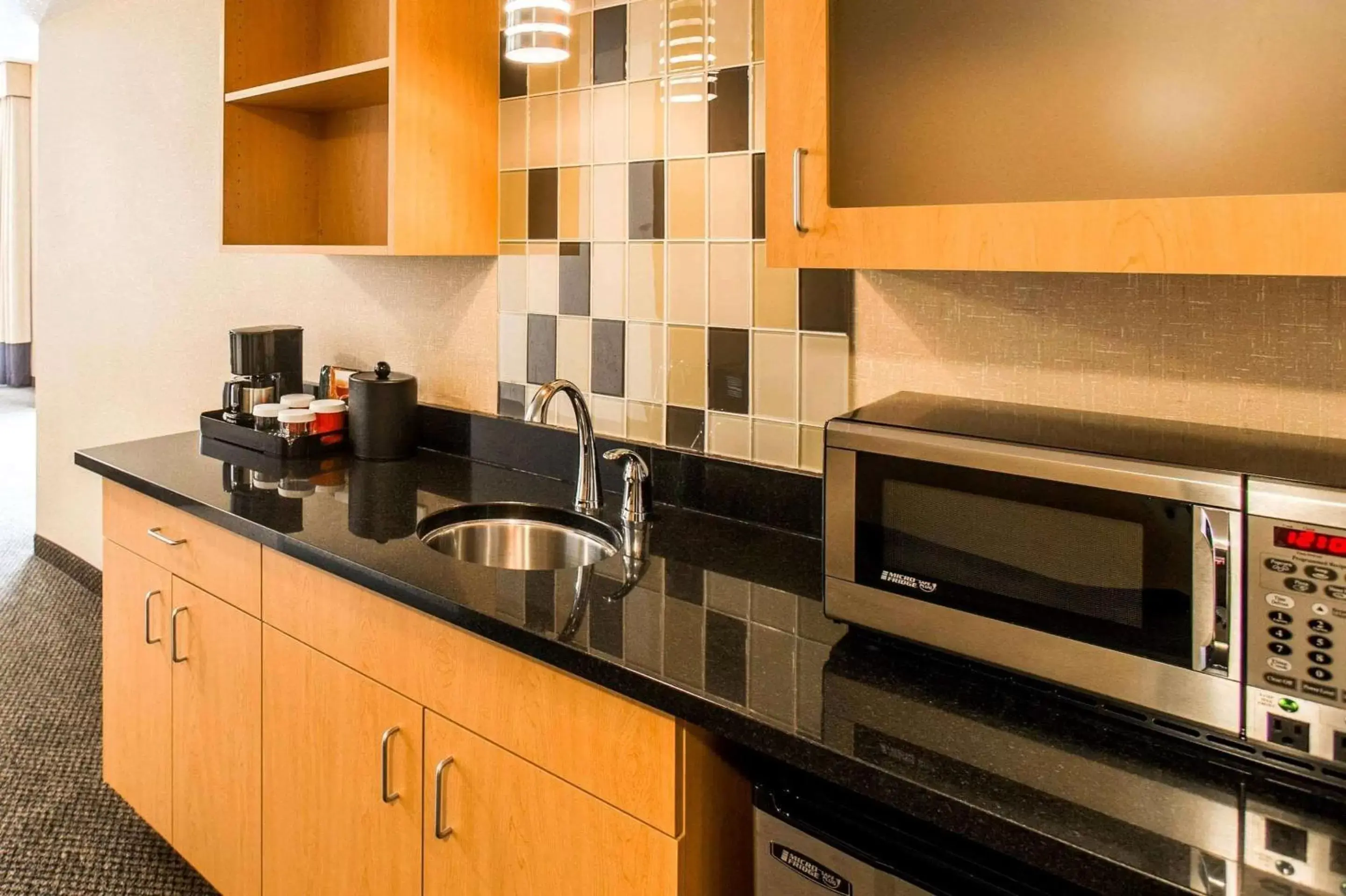 Photo of the whole room, Kitchen/Kitchenette in Cambria Hotel Rapid City near Mount Rushmore