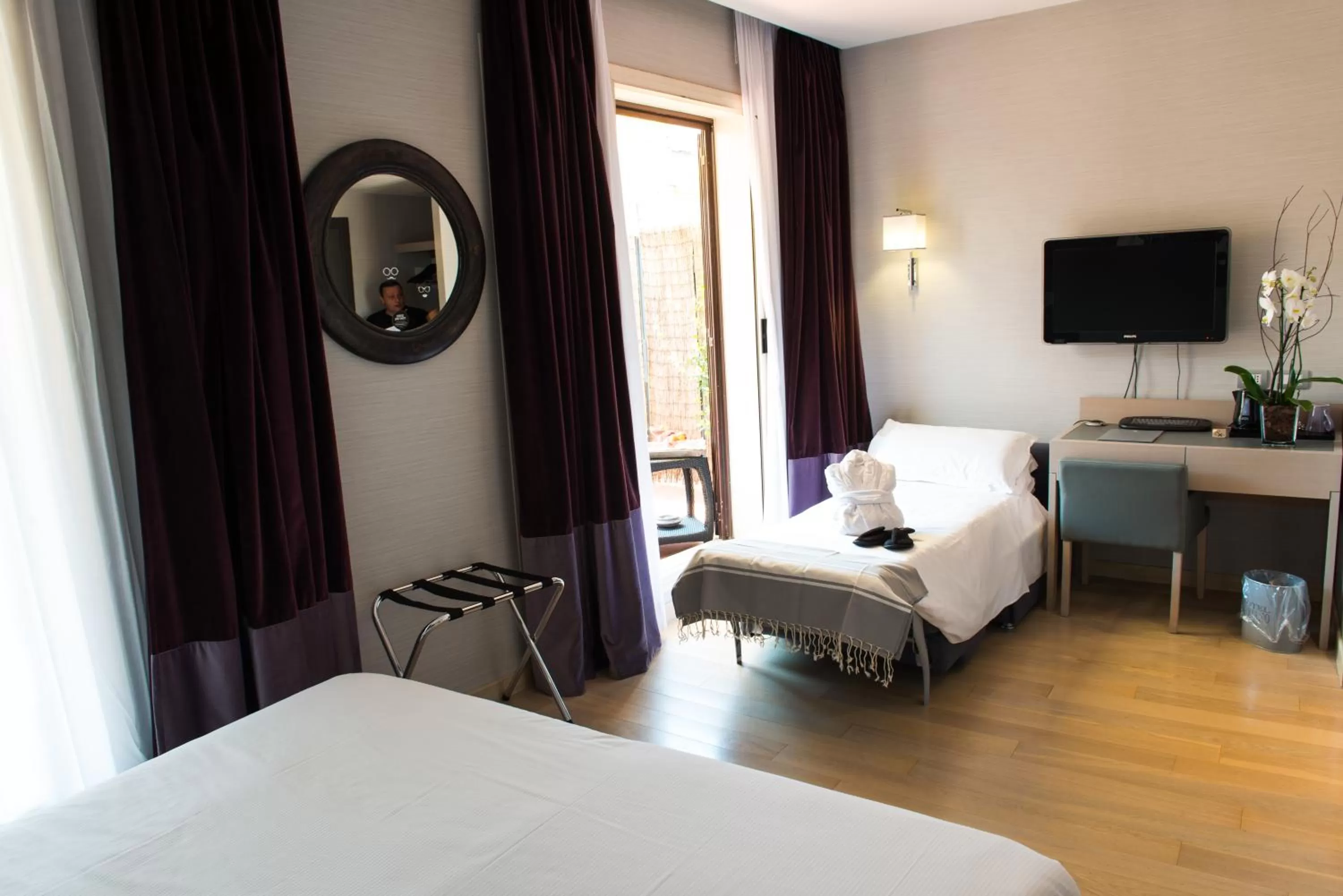 Bed in Hotel Adriano