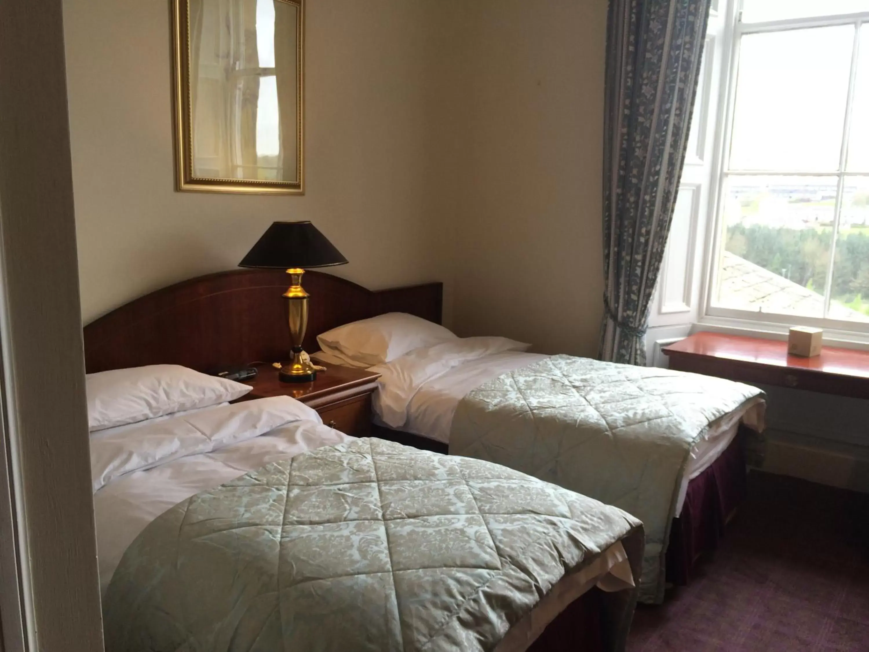 Bed in Mansfield House Hotel