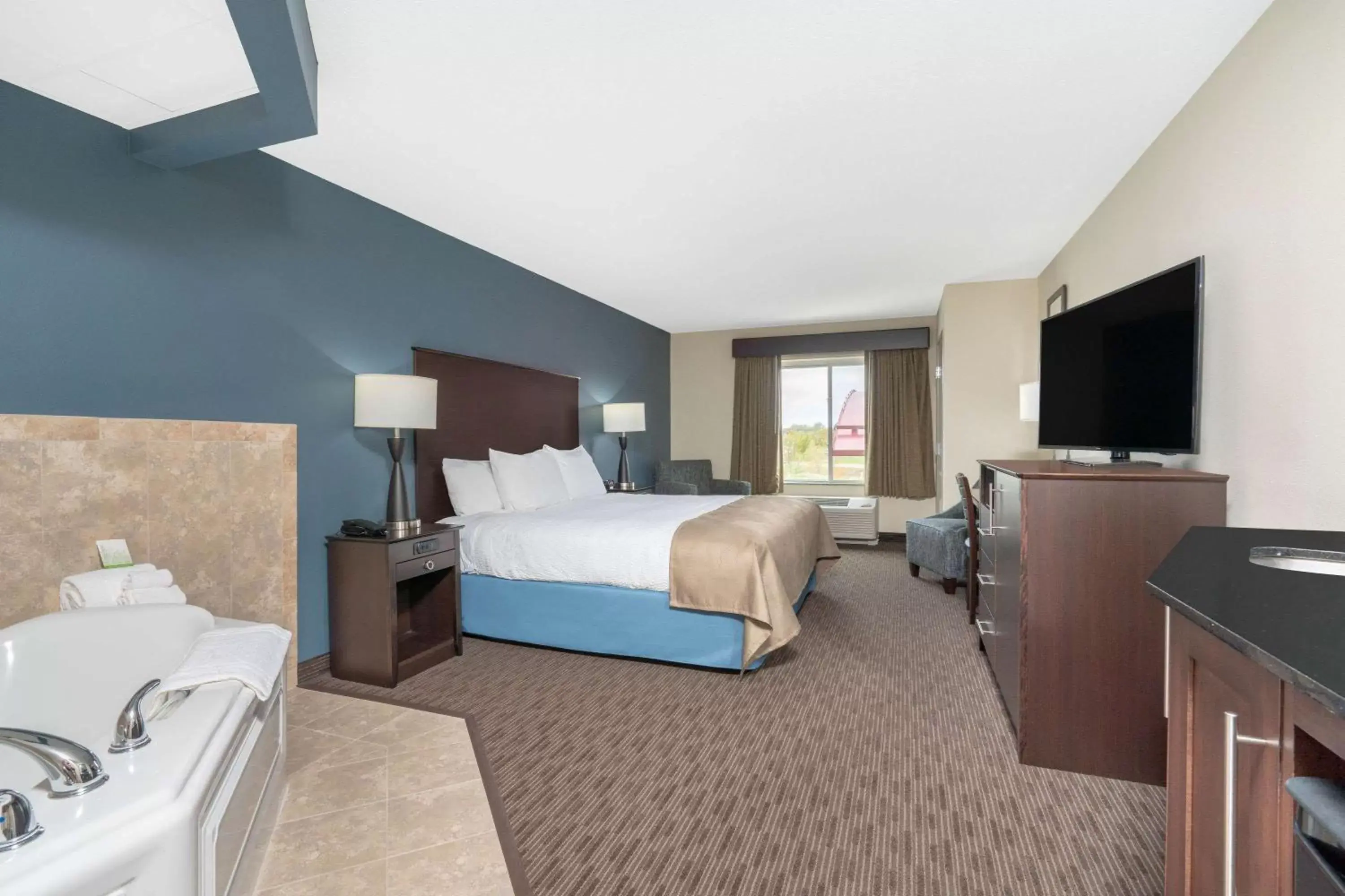 Photo of the whole room in AmericInn by Wyndham Windom