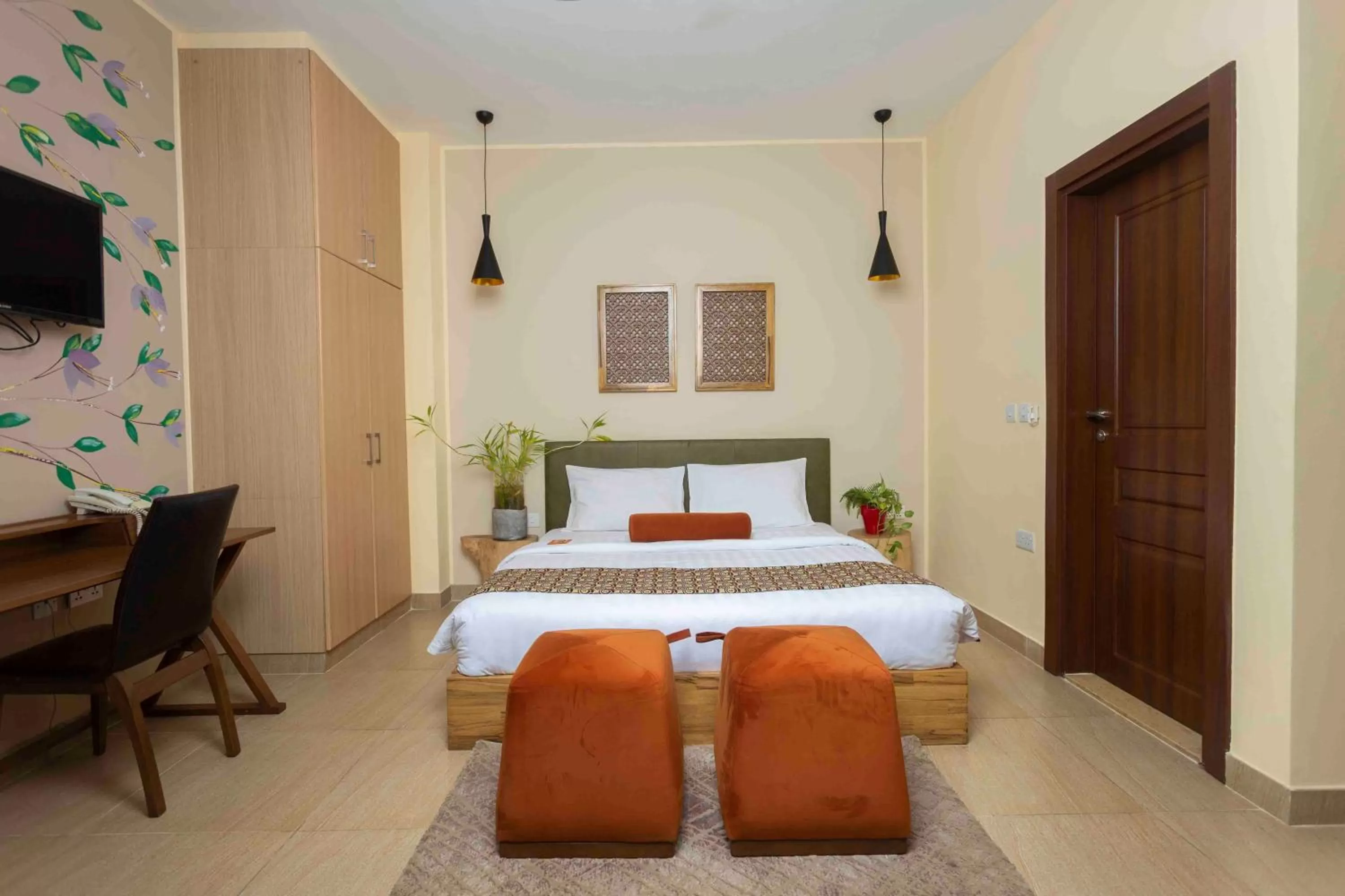 Bed in Roots Hotel Apartment