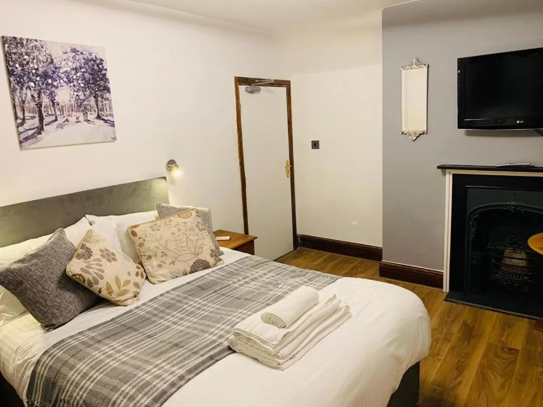 Bed in The Compasses Inn