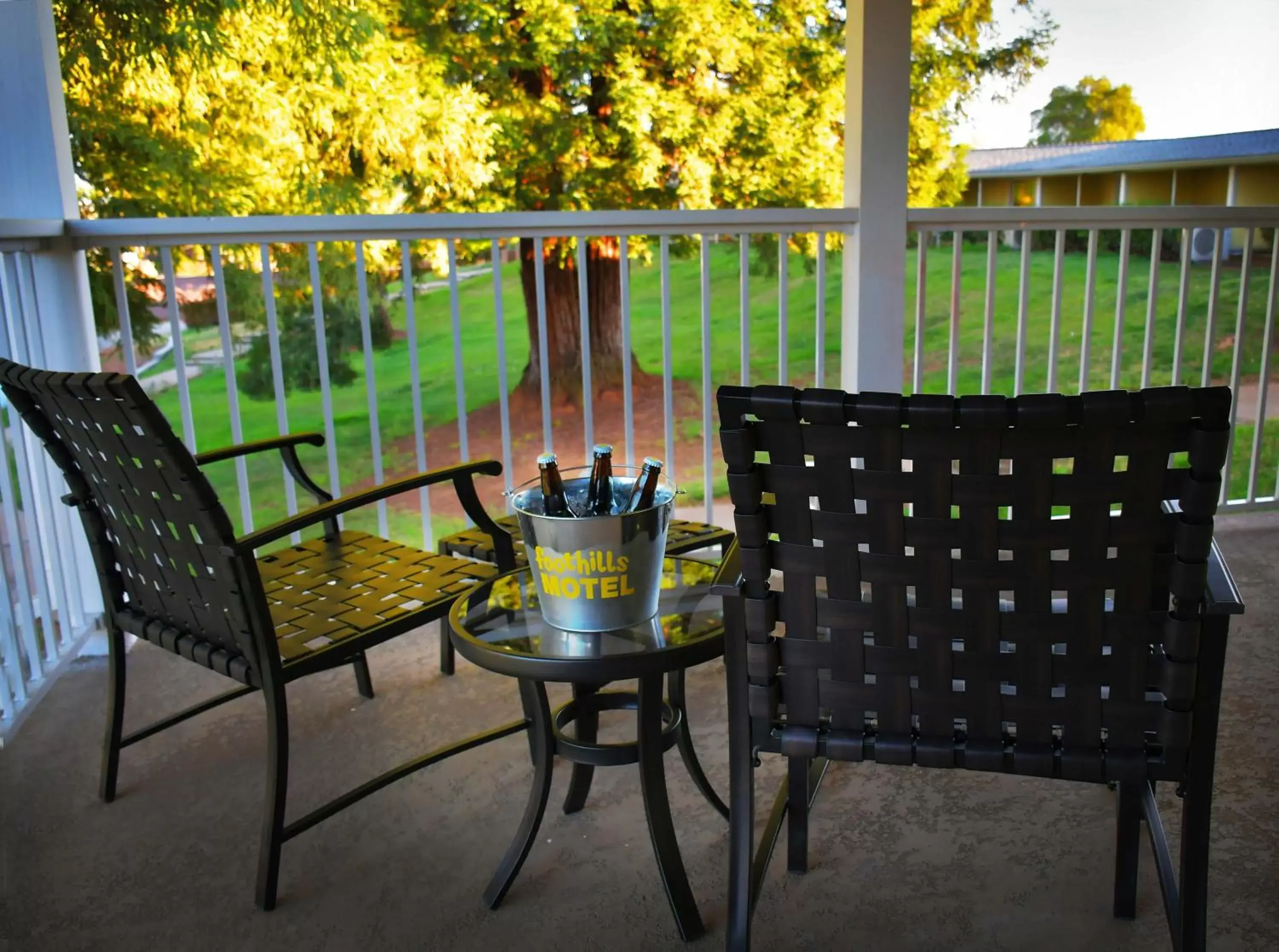 Patio, Pool View in Foothills Motel