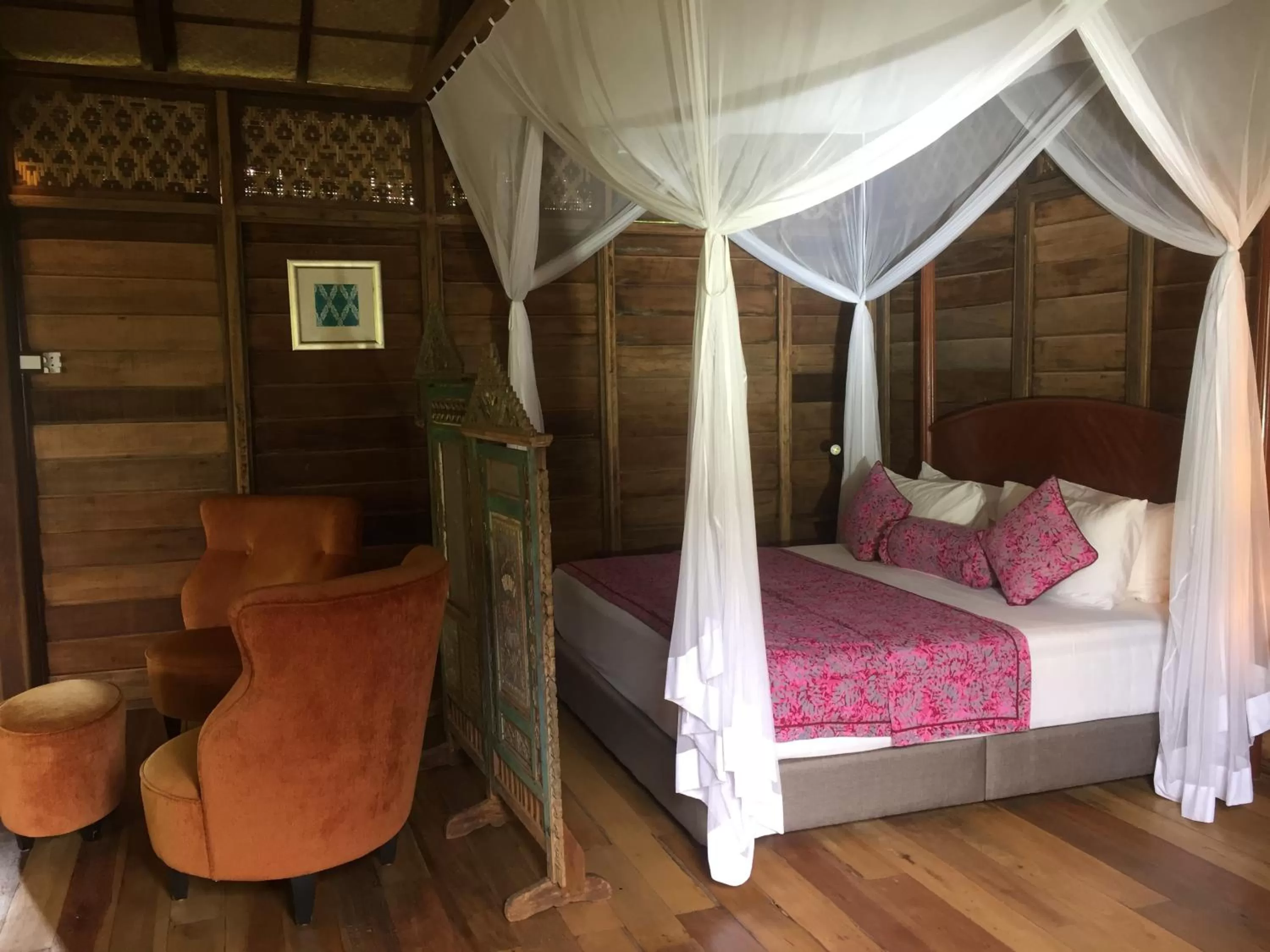 Bed in Kunang Kunang Heritage Villas