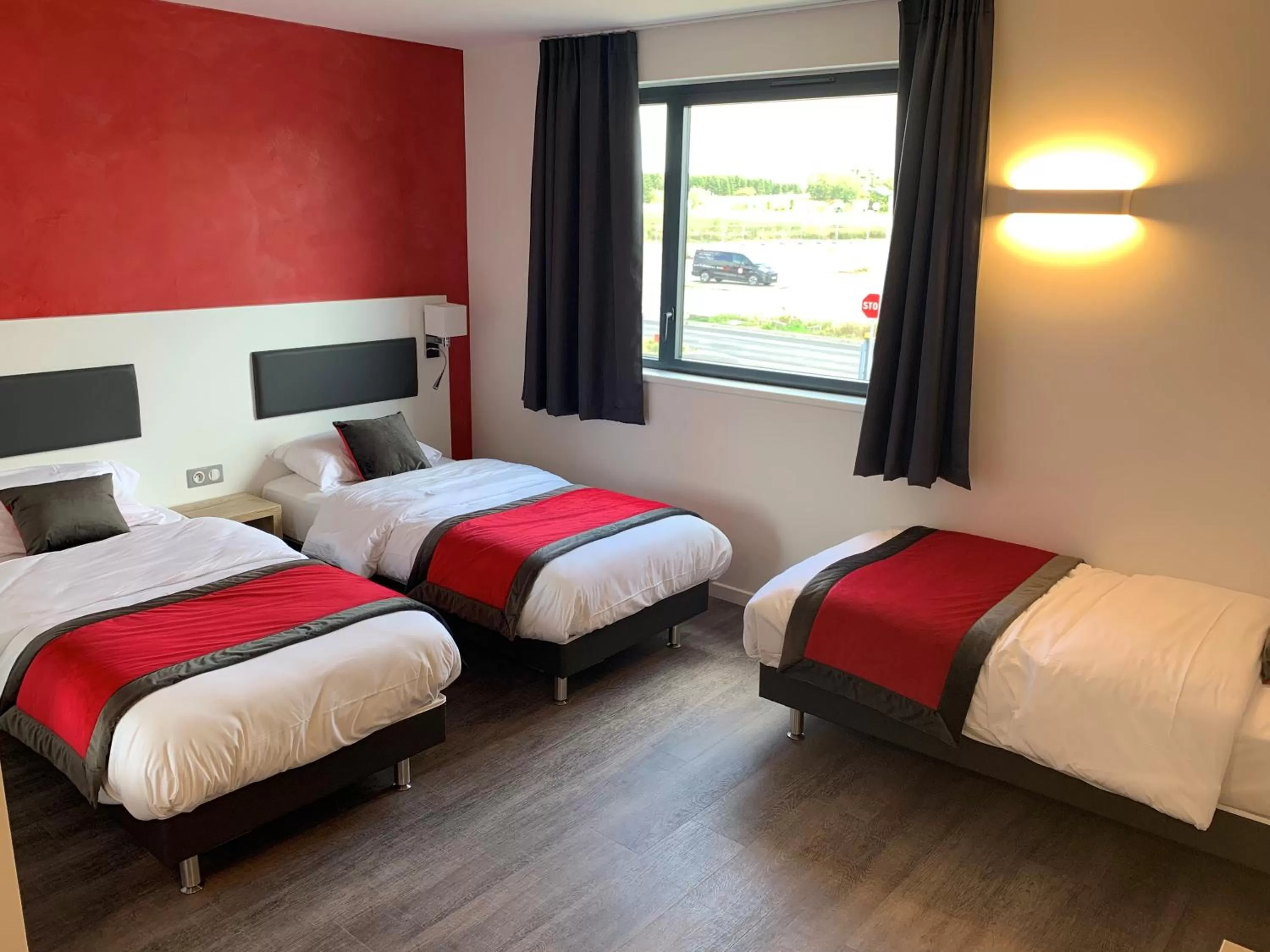 Bed in ATOLON PARK HOTEL