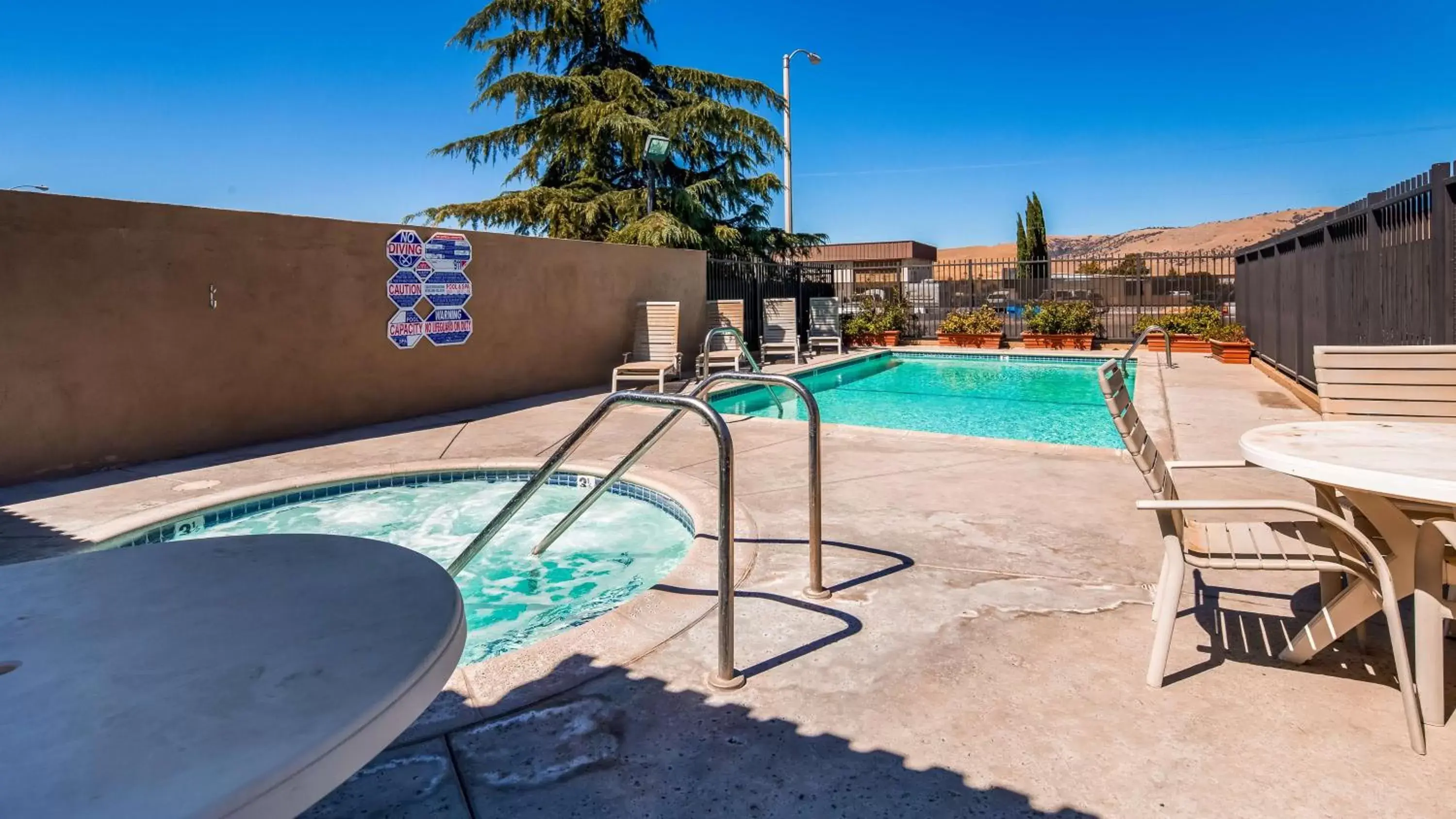 On site, Swimming Pool in SureStay Hotel by Best Western Tehachapi