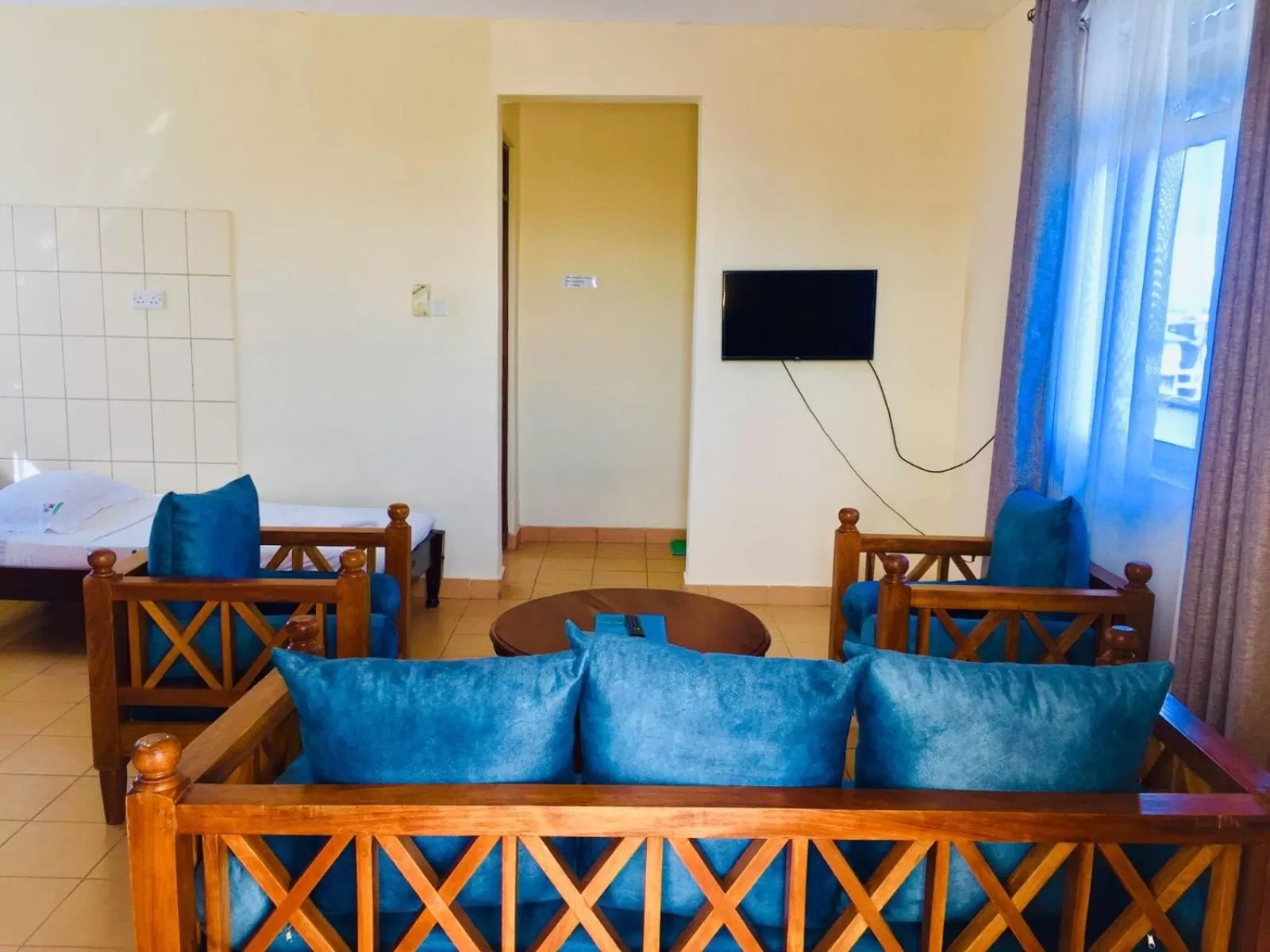 TV and multimedia in Merry Villa Hotel & Apartments