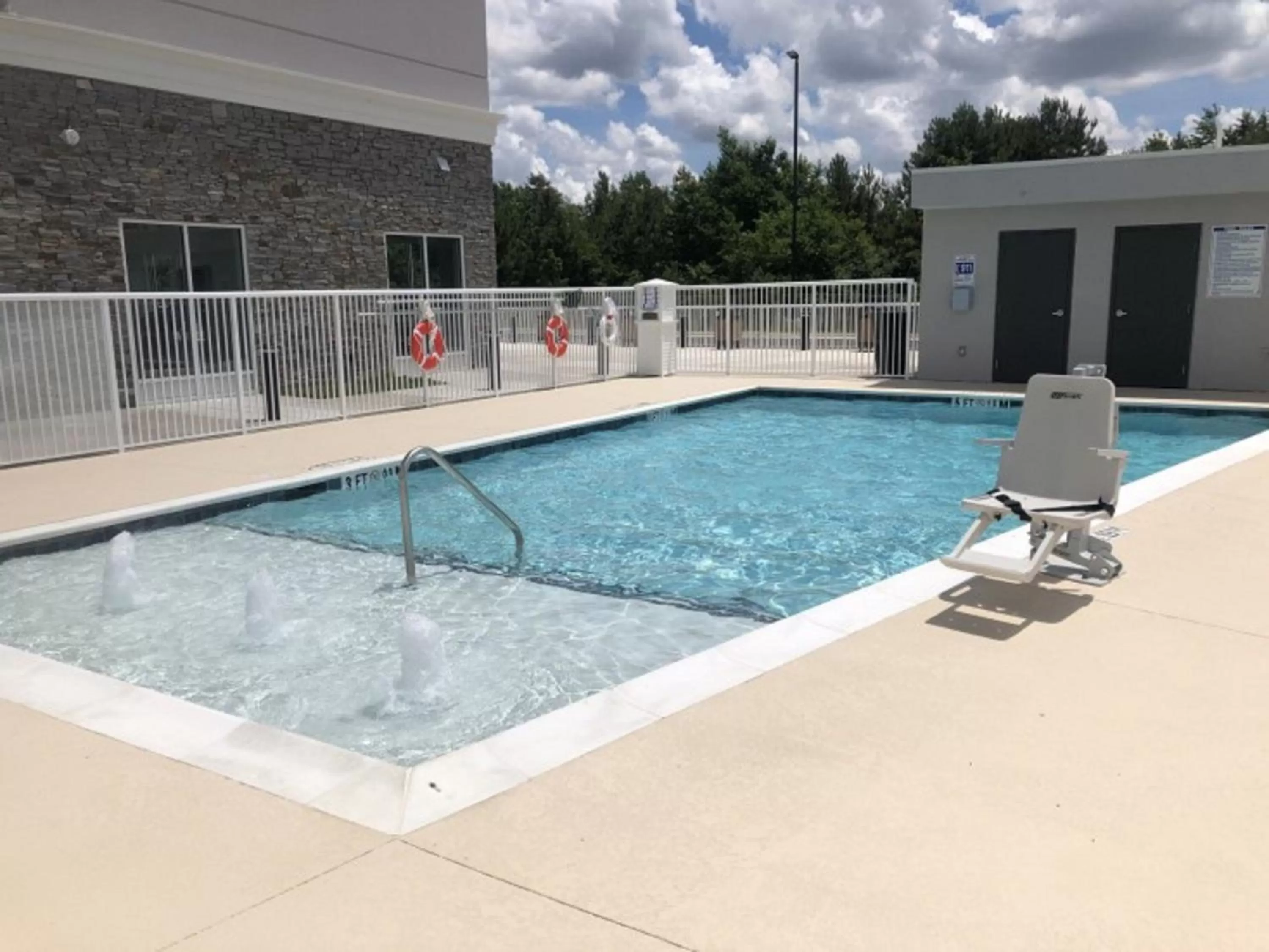 Swimming pool in Holiday Inn & Suites - Fayetteville W-Fort Bragg Area by IHG