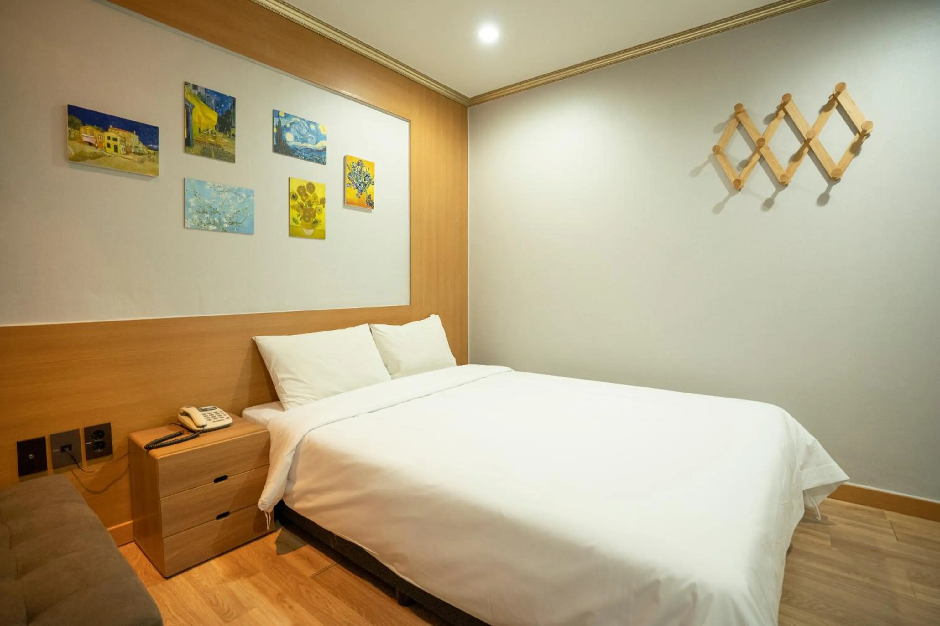 Bed in Jeju Stay Hotel