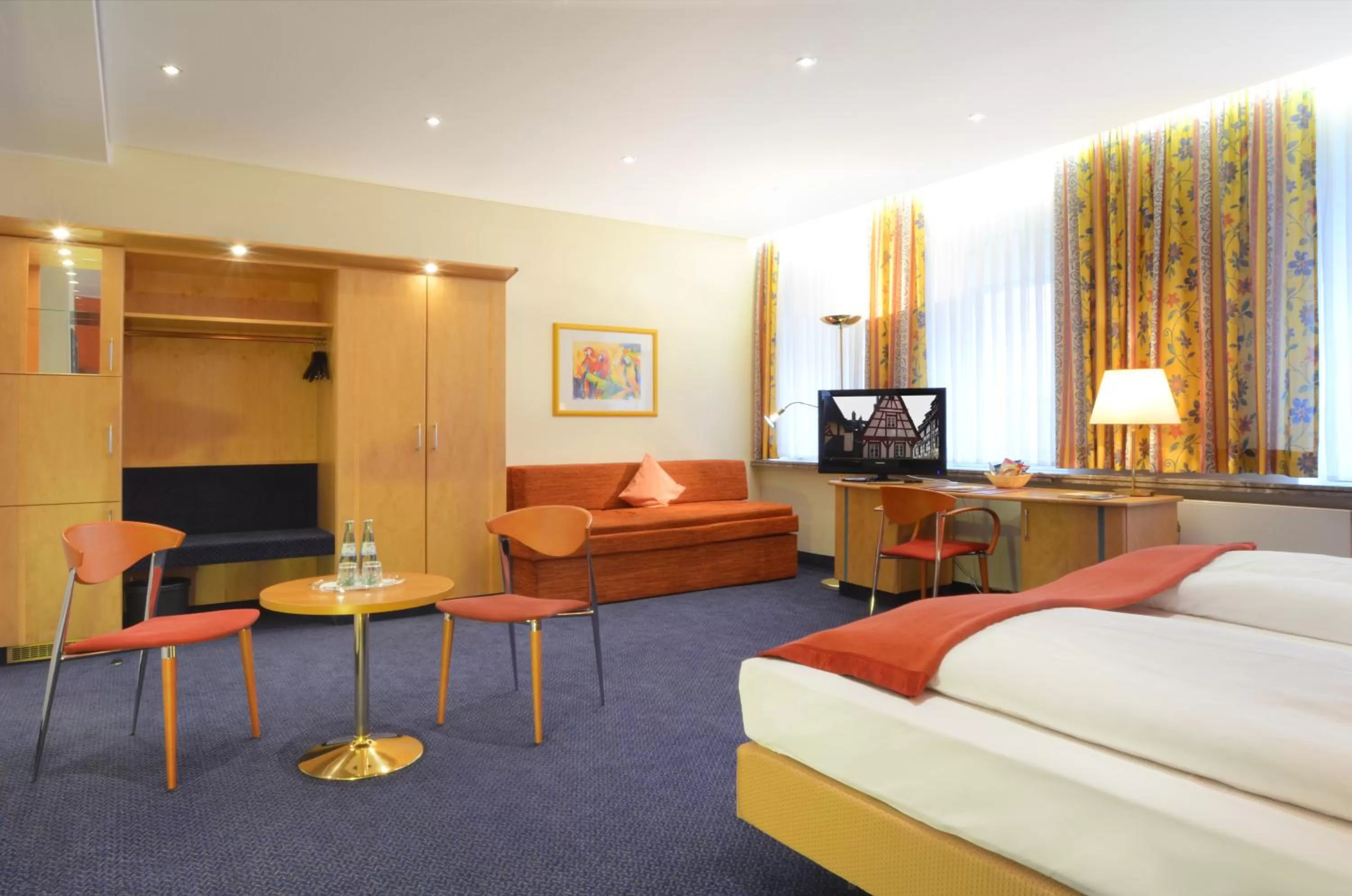 Photo of the whole room, Bed in Ringhotel Loew's Merkur