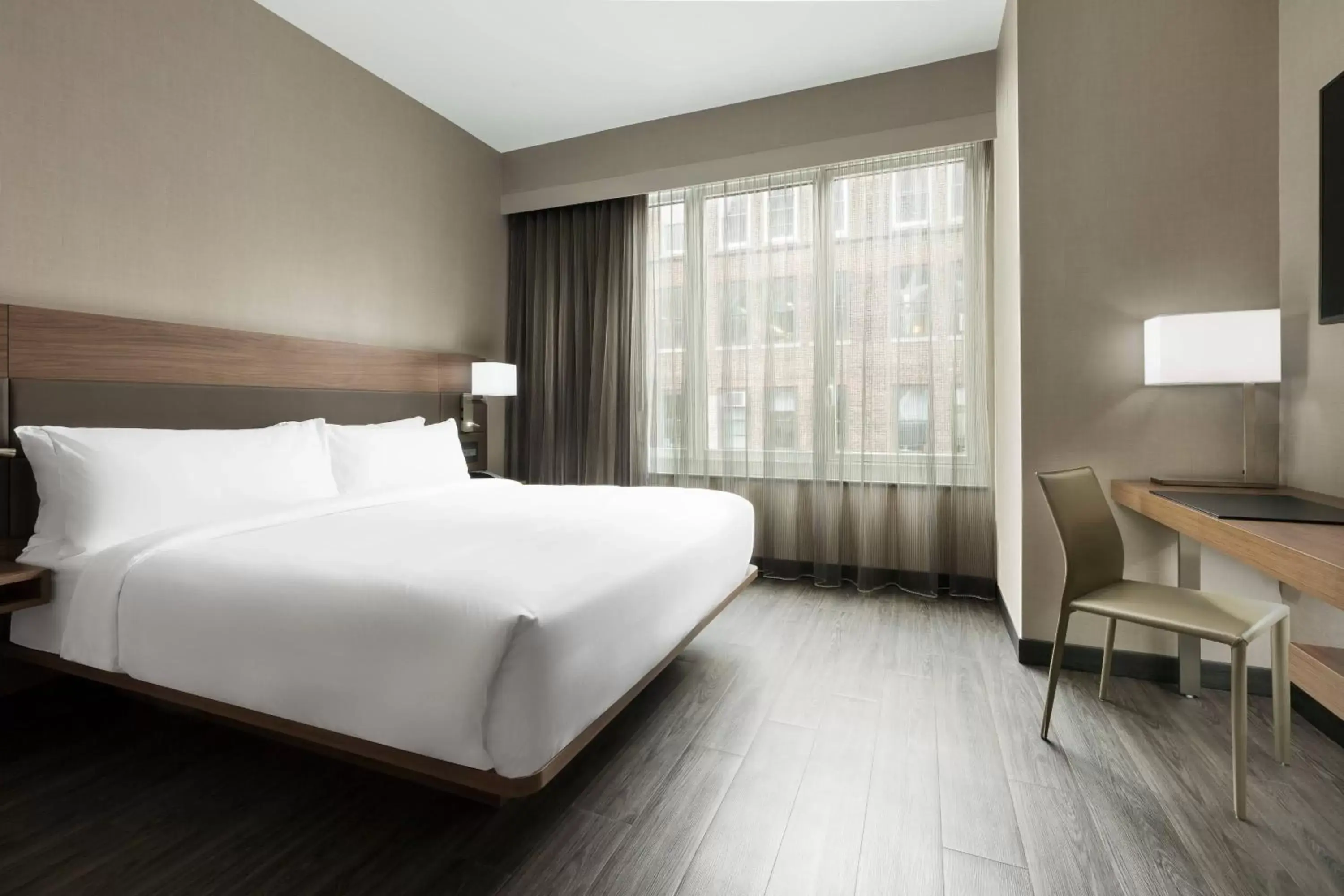Photo of the whole room, Bed in AC Hotel by Marriott New York Times Square
