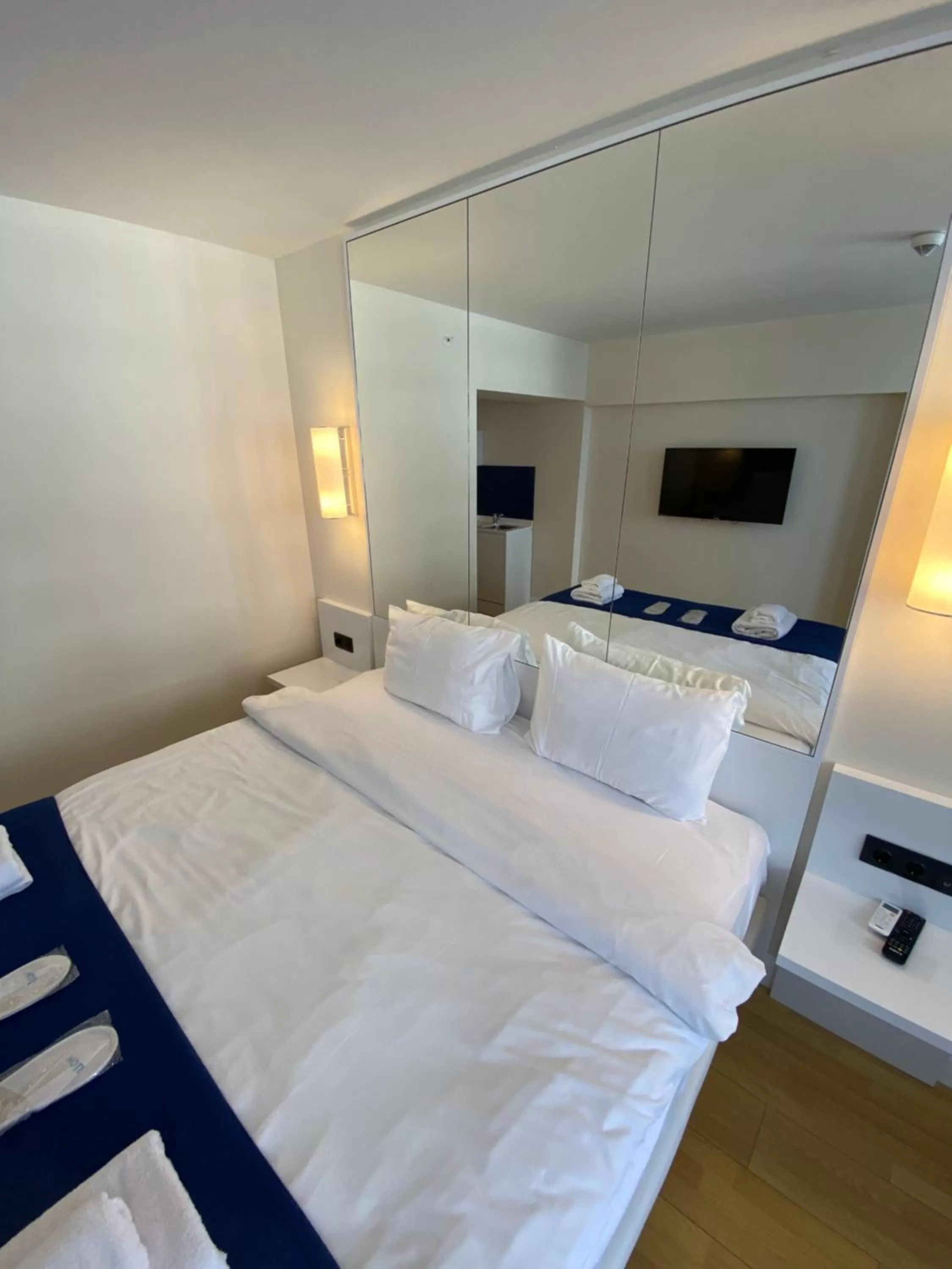 Bed in Orbi City Luxury Suite