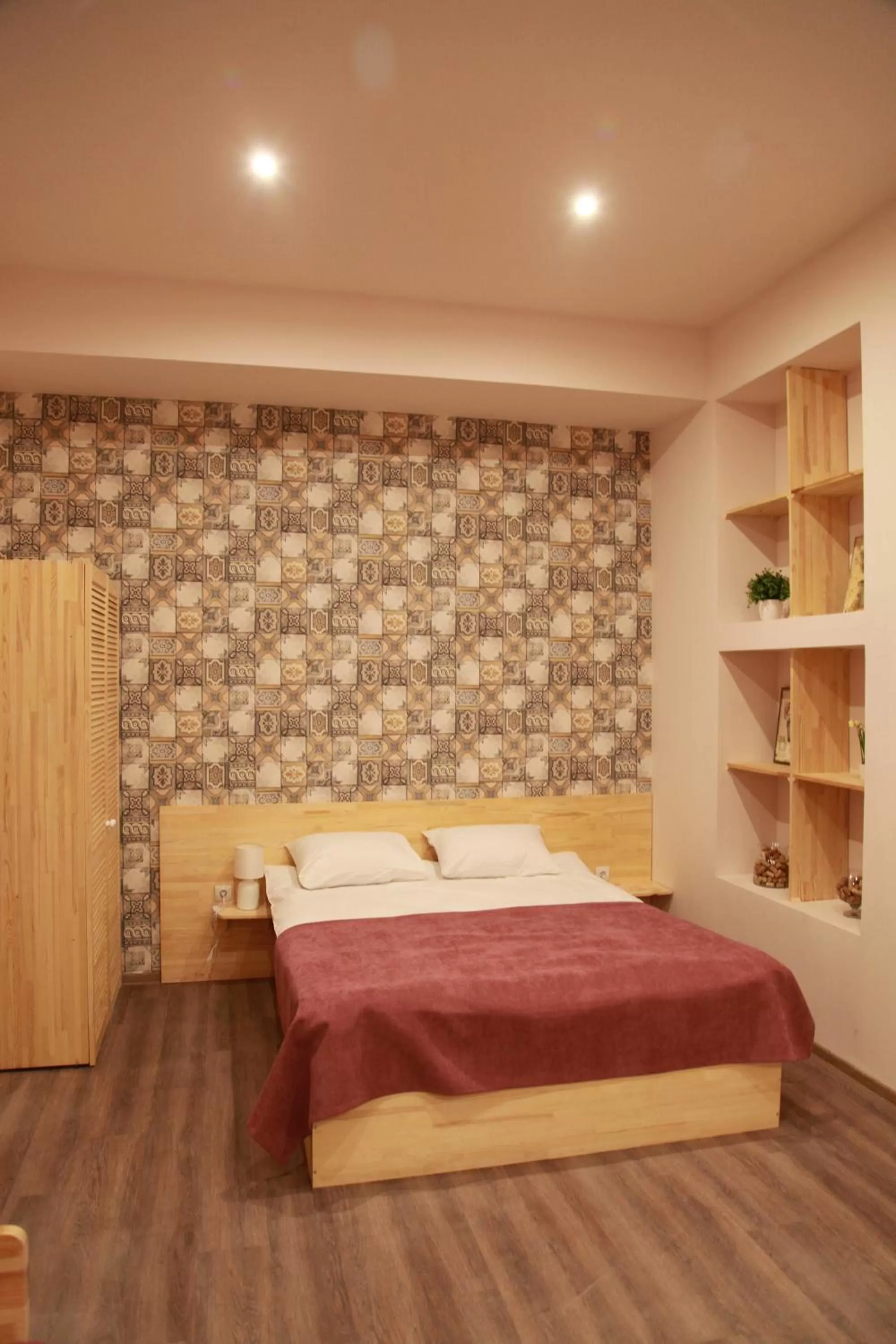 Bed in WINE & ROSE BOUTIQUE HOTEL